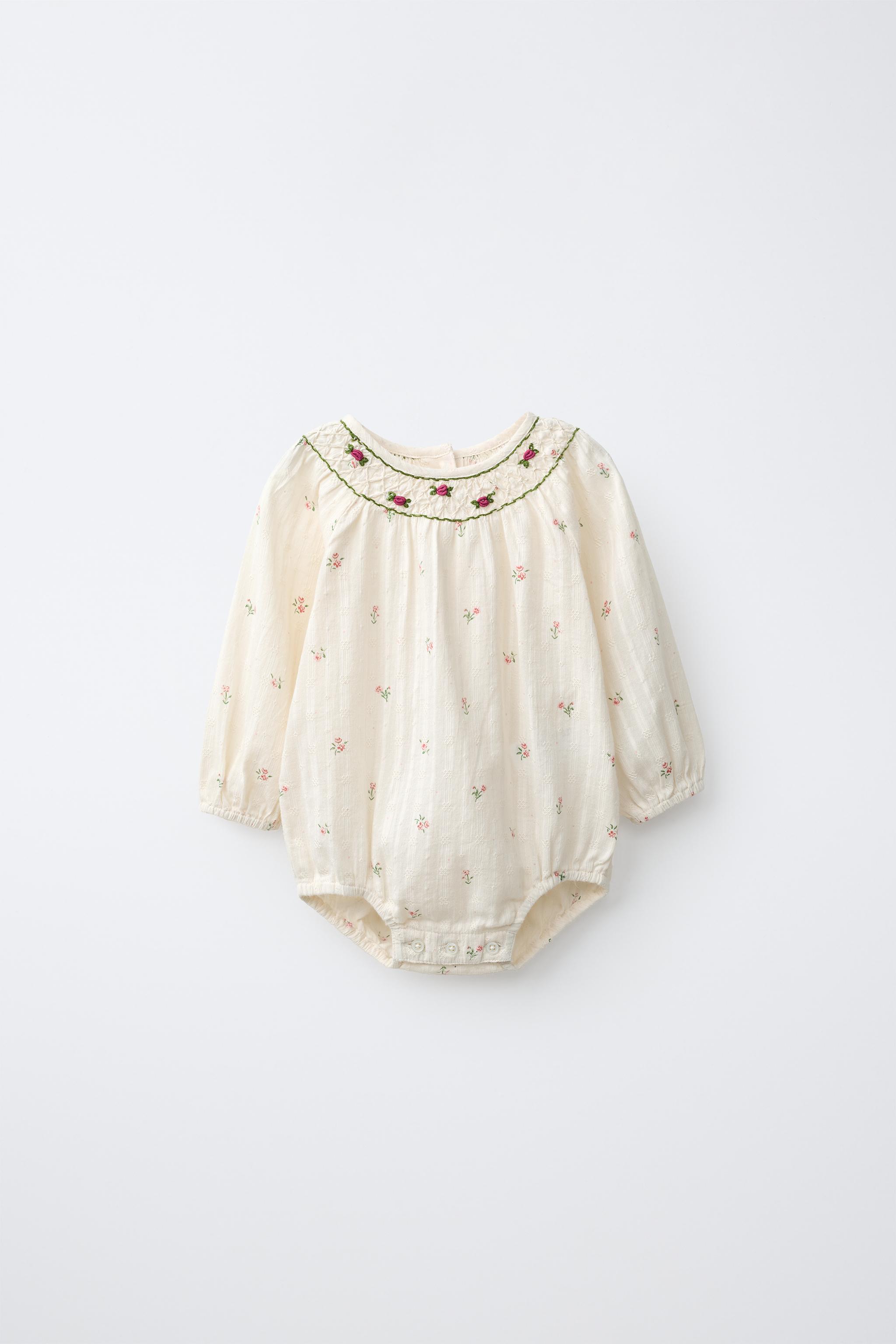 EMBROIDERED FLORAL BODYSUIT