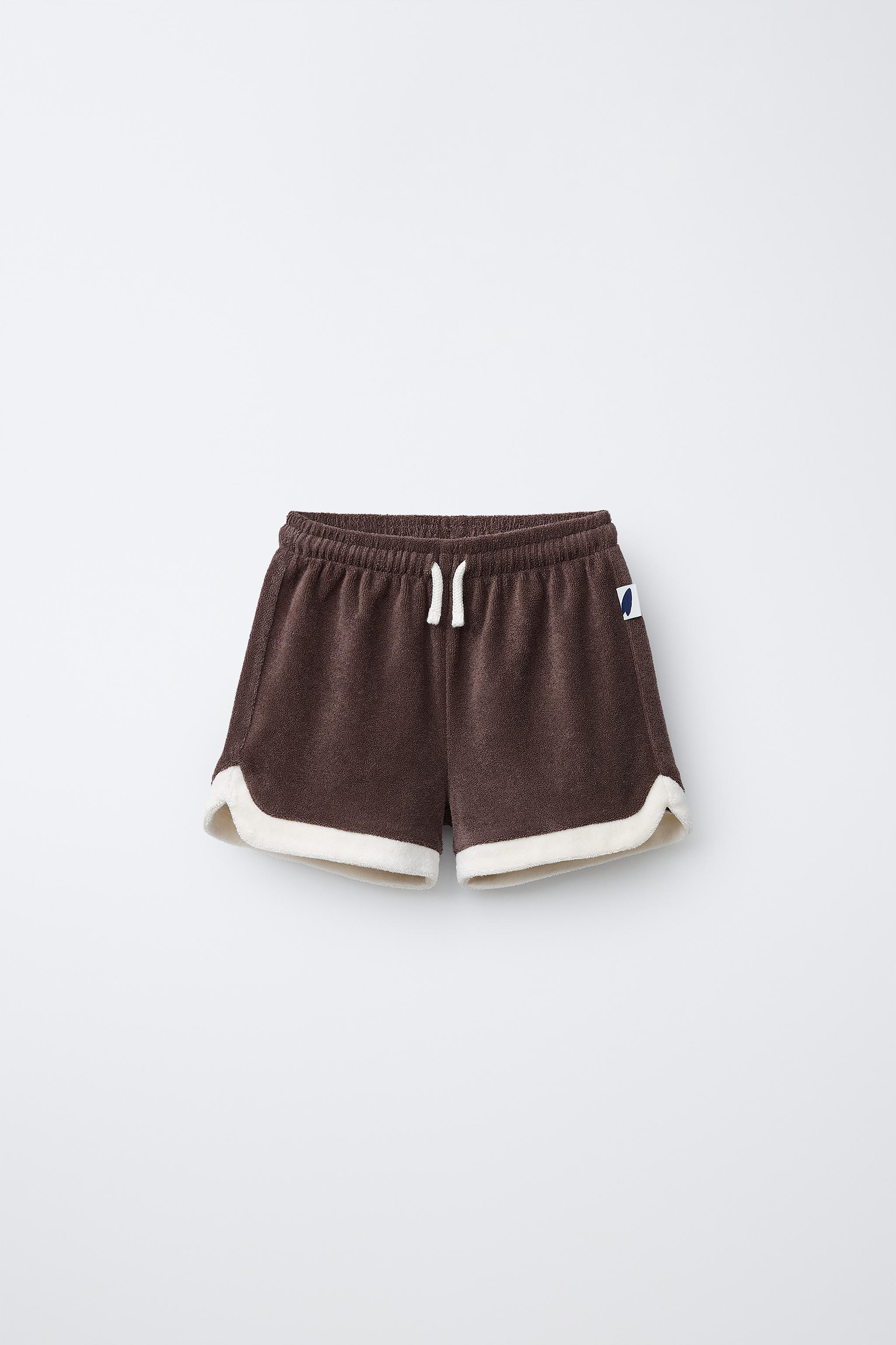 SHORT EFFET ÉPONGE AVEC ÉTIQUETTE