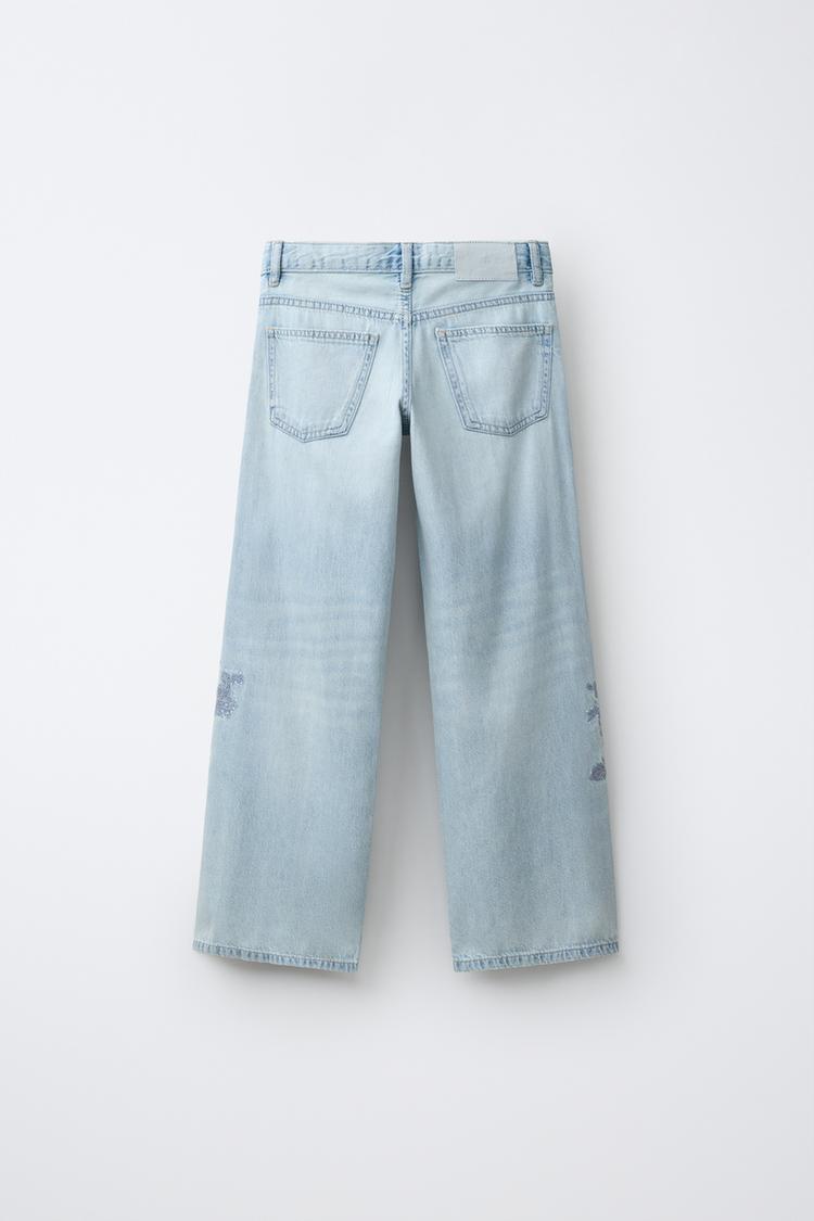 Jeans de pierna ancha con bordado floral y pedrería 2