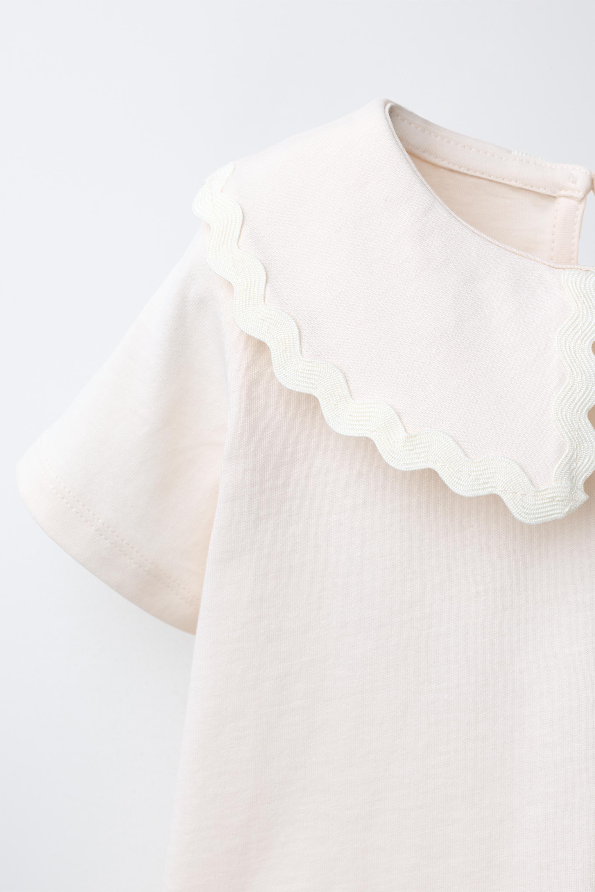 PETER PAN COLLAR TOP WITH RIPPLE TRIM