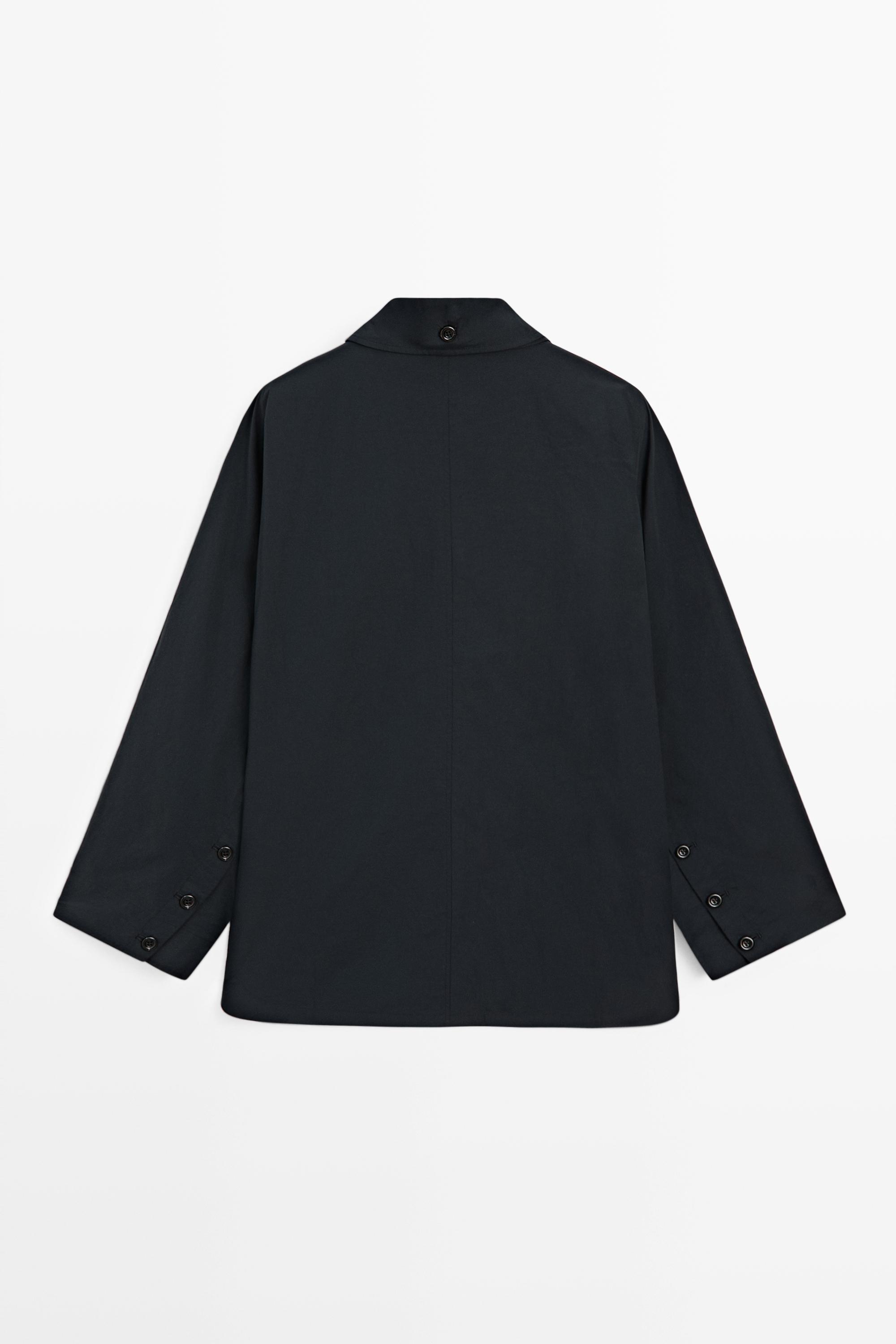 Veste-cape col patte boutonnée