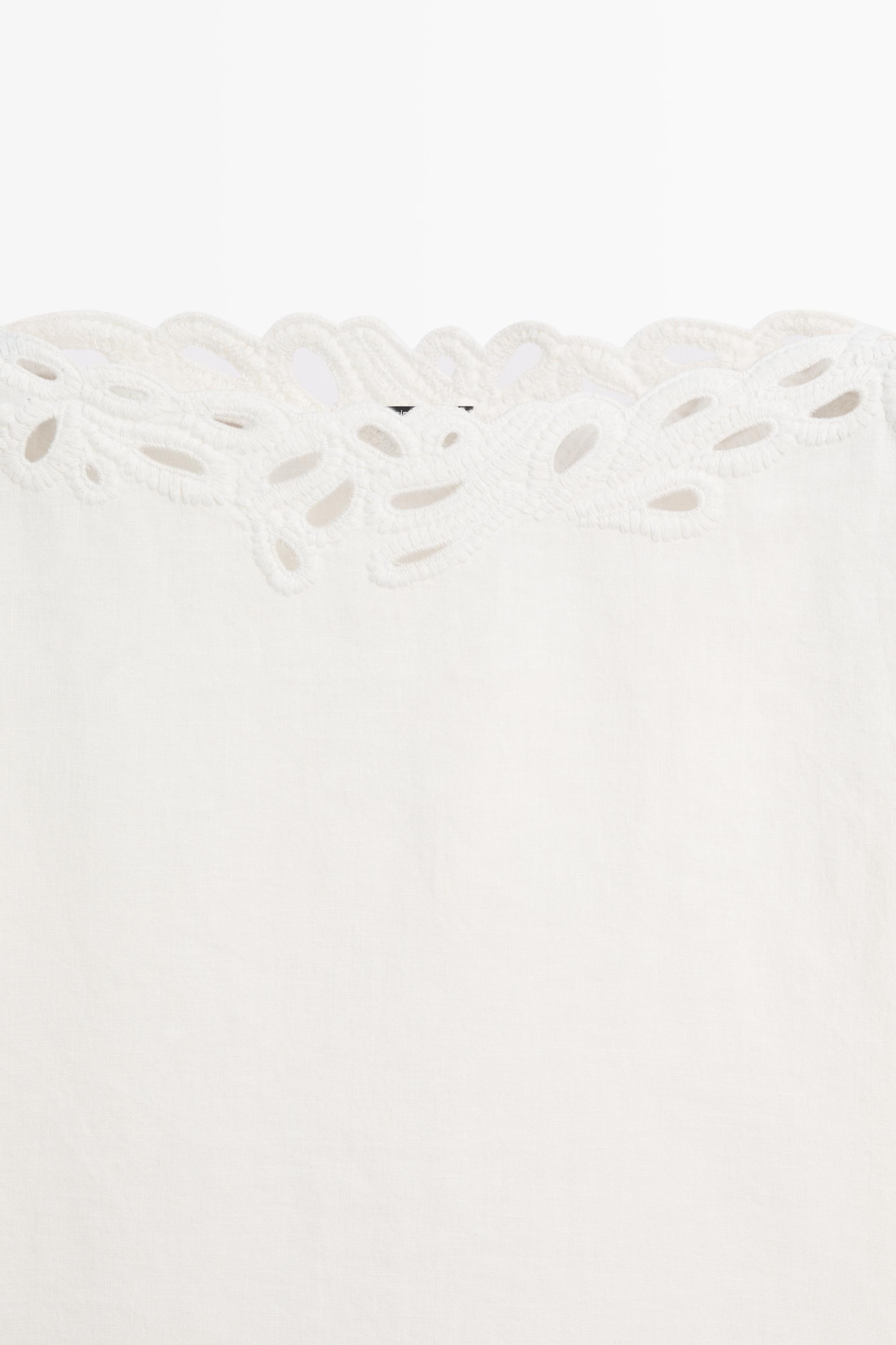 Linen boat neck blouse with embroidery