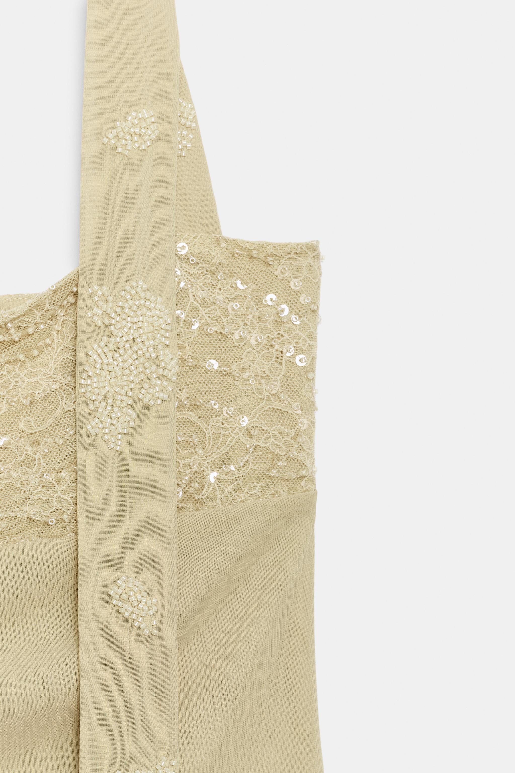 EMBROIDERED HALTER TOP