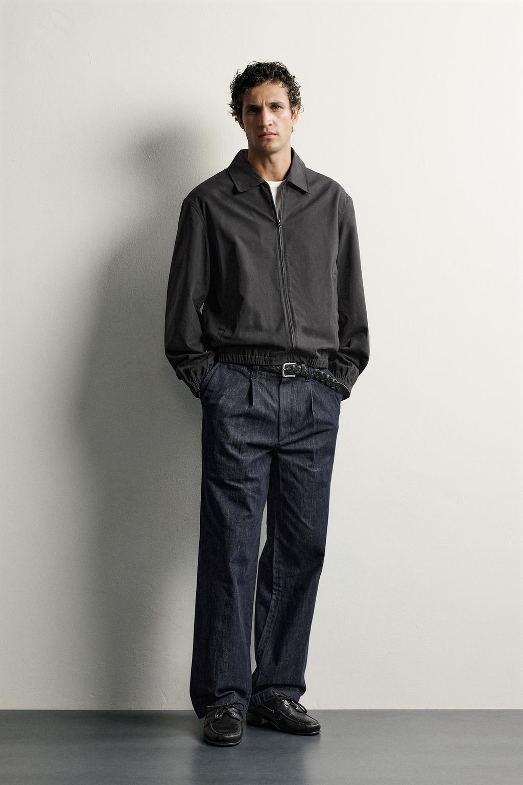 PLEATED DENIM CHINO TROUSERS