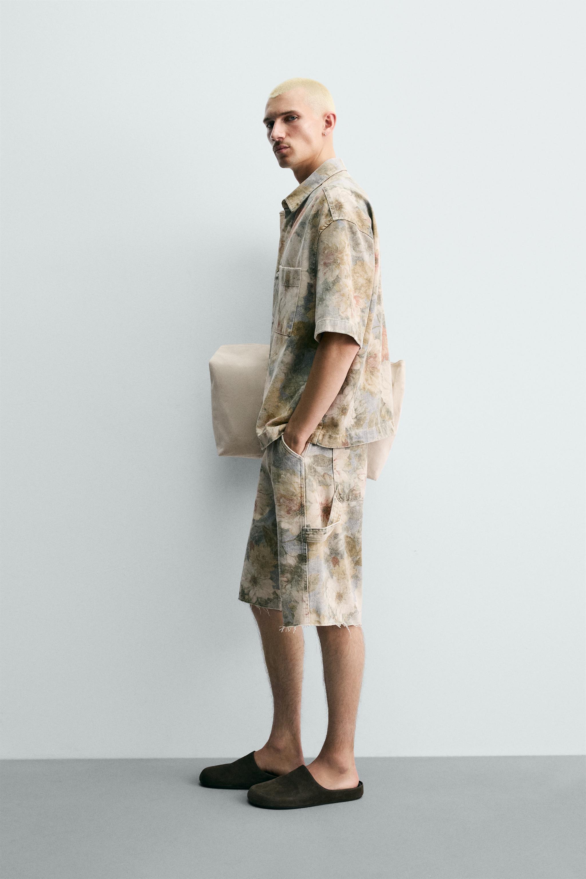 WASHED FLORAL PRINT RELAXED FIT SHORTS