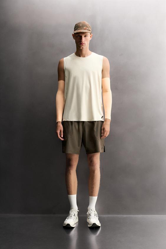 PLAYERA TANK RUNNING - Hueso de Zara - Imagen 0
