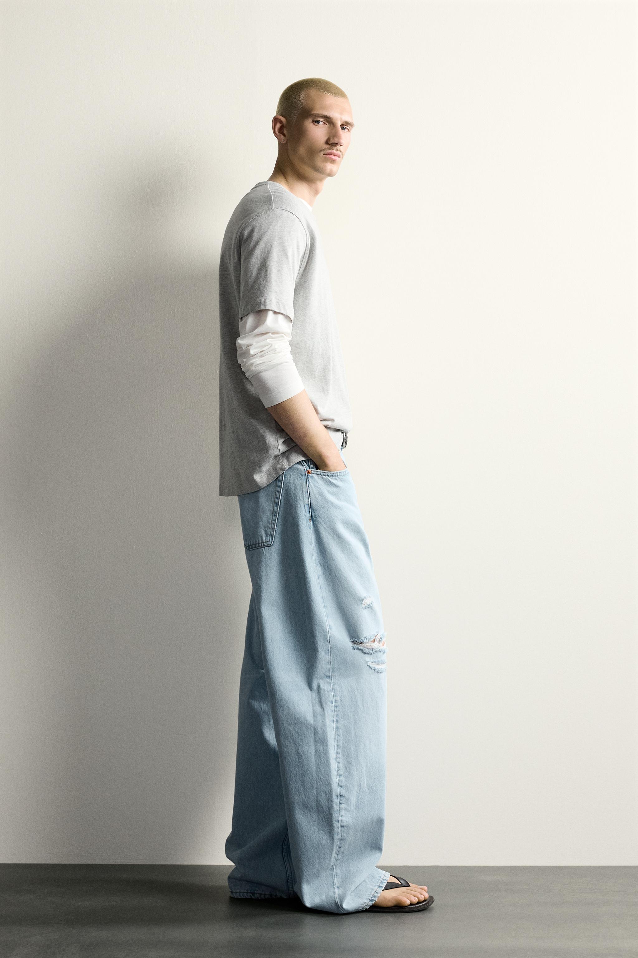 RIPPED BARREL FIT JEANS