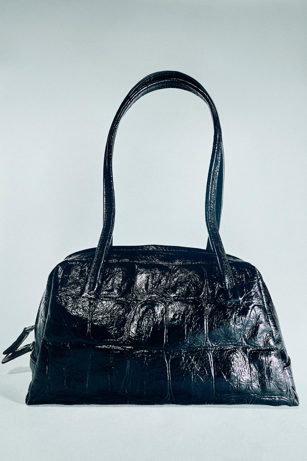 TEXTURED LEATHER SHOULDER BOWLING BAG