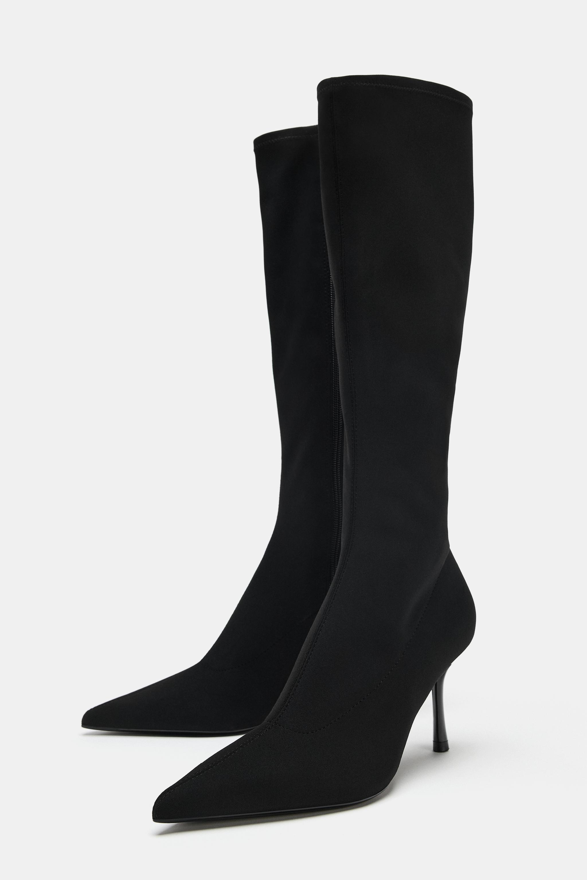 STRETCH HEELED BOOTS