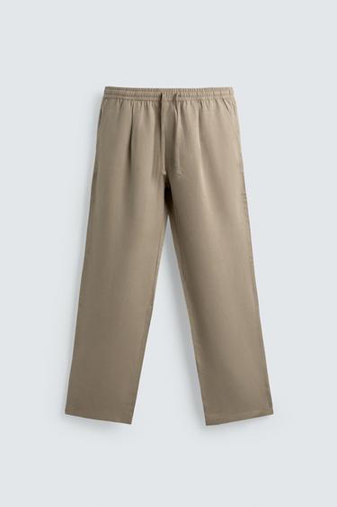 RELAXED FIT FLOWING TROUSERS - camel by Zara