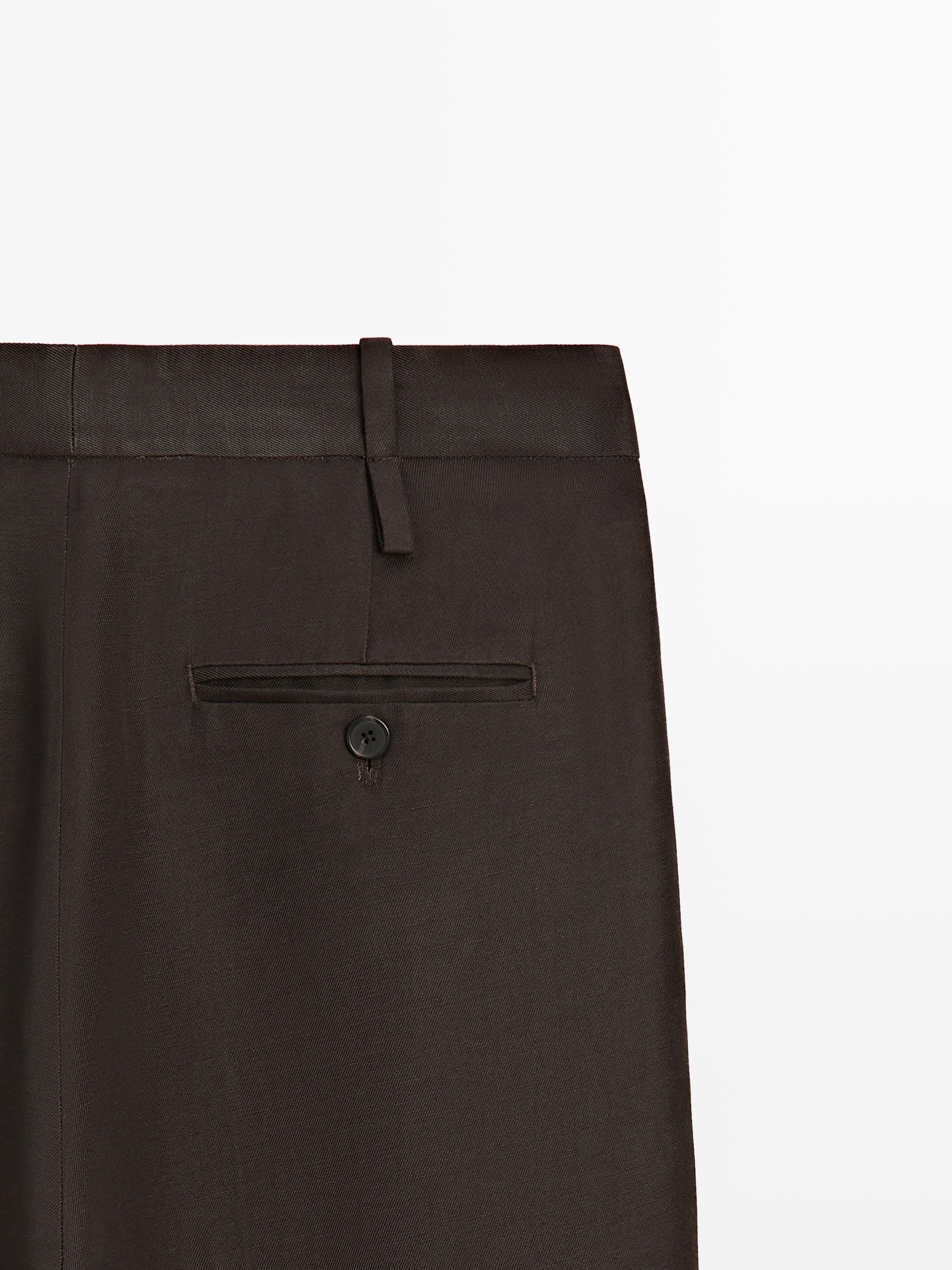Pantalon à pinces avec passants - STUDIO