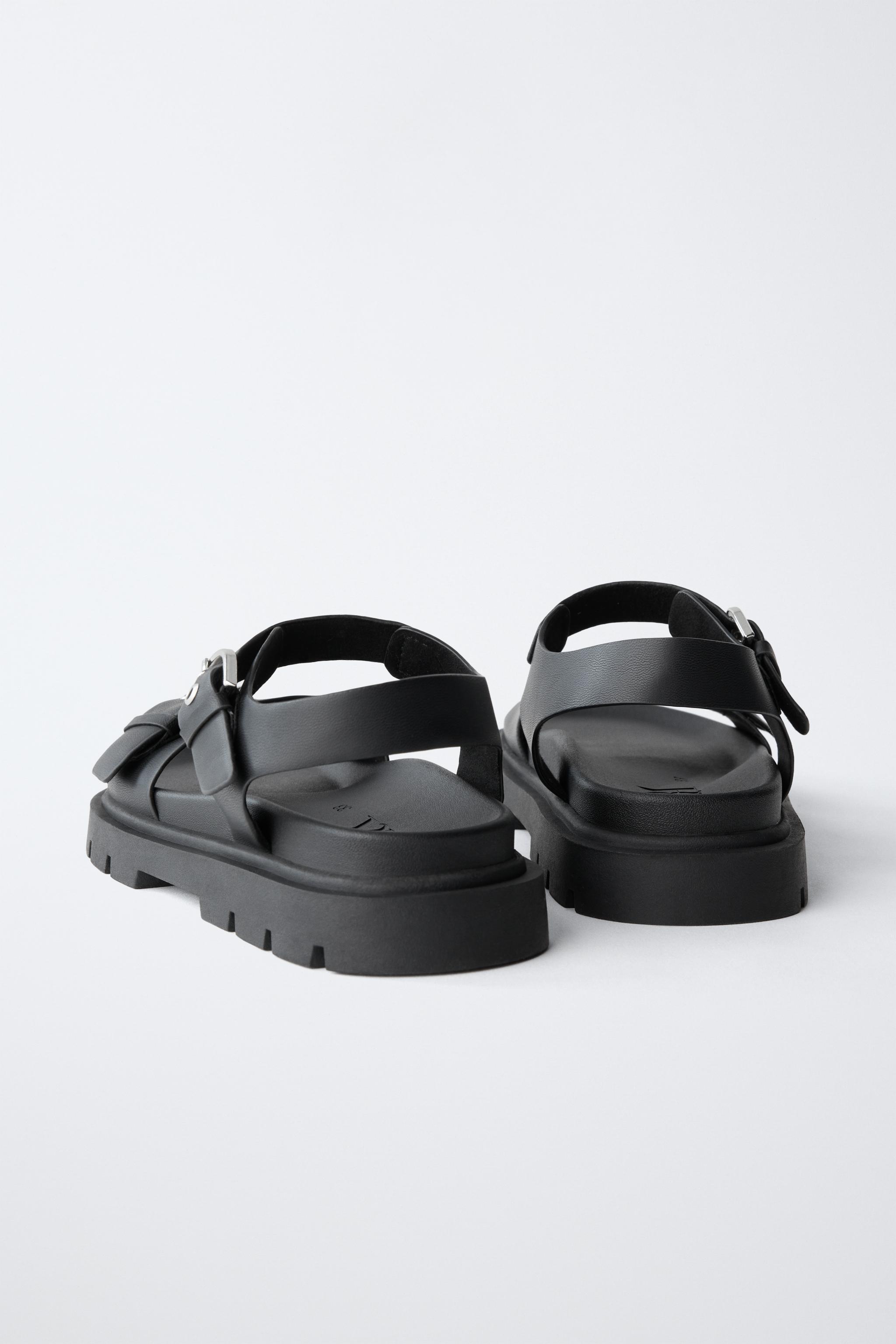 BUCKLED SANDALS
