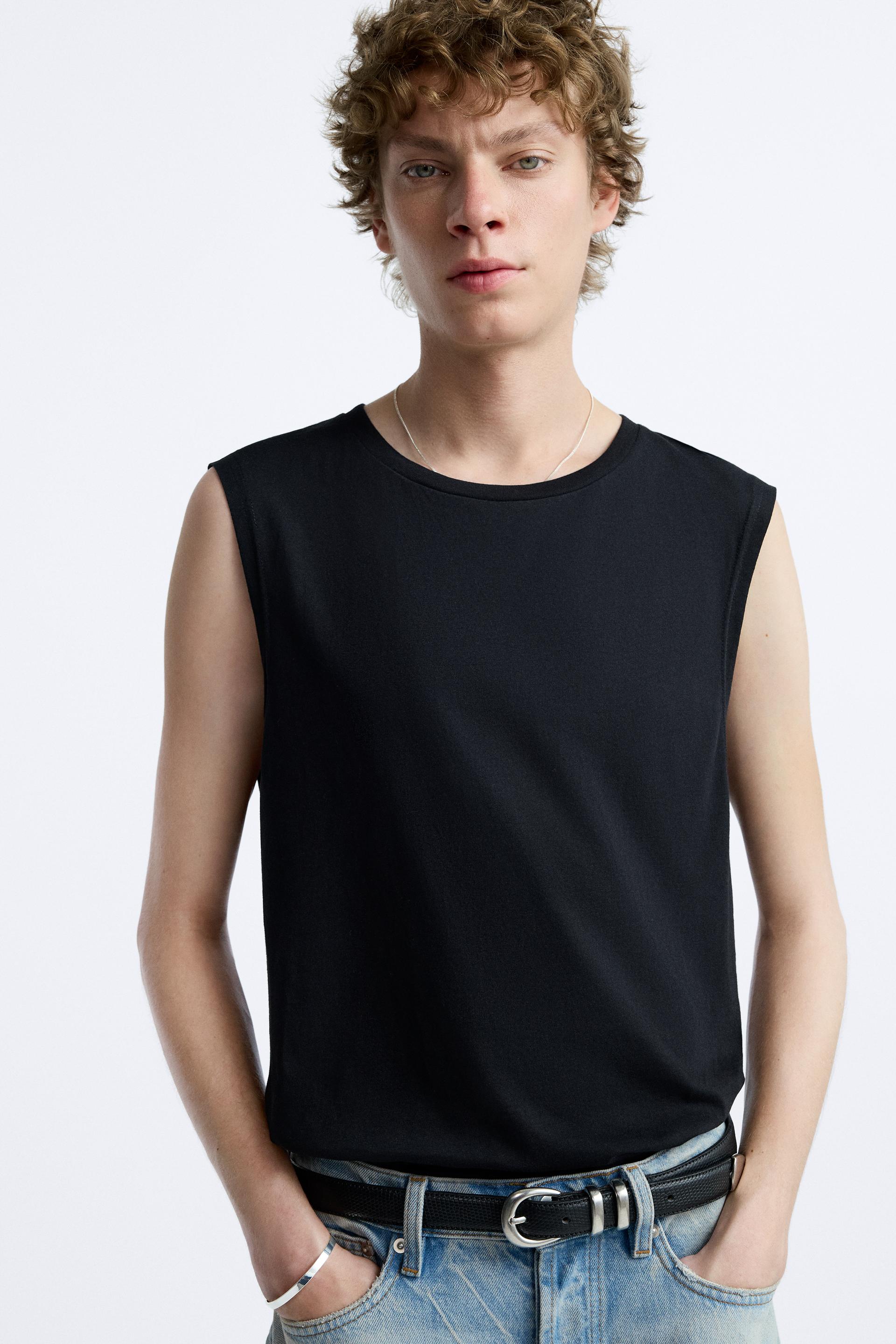 Men Sleeveless With Raw Edge And Contrast Raglan In White Black Tank Top  Wholesale Manufacturer & Exporters Textile & Fashion Leather Clothing Goods  with we have provide customization Brand your own