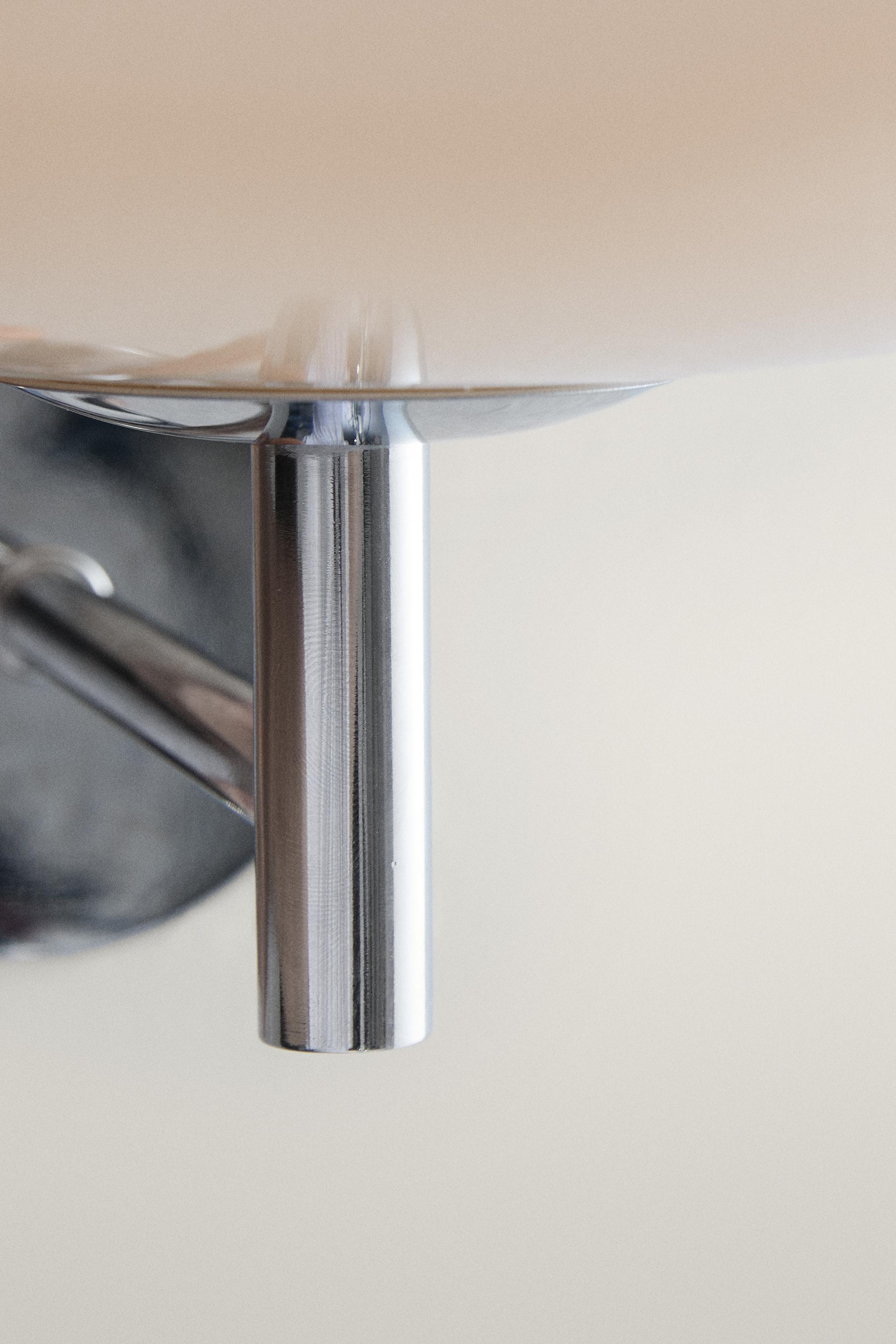ROUNDED GLASS AND IRON WALL LIGHT