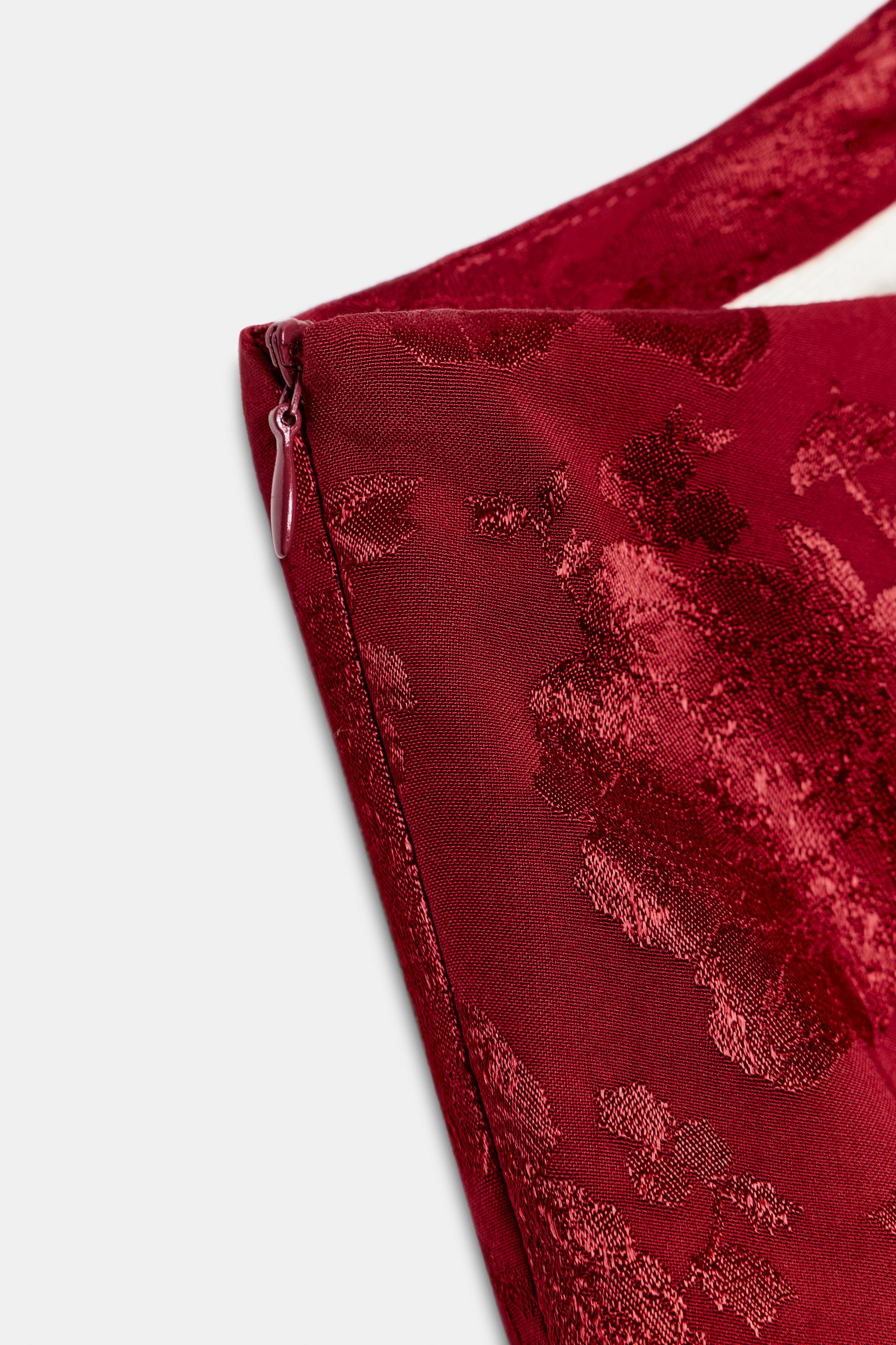 ASYMMETRIC JACQUARD BELTED TOP