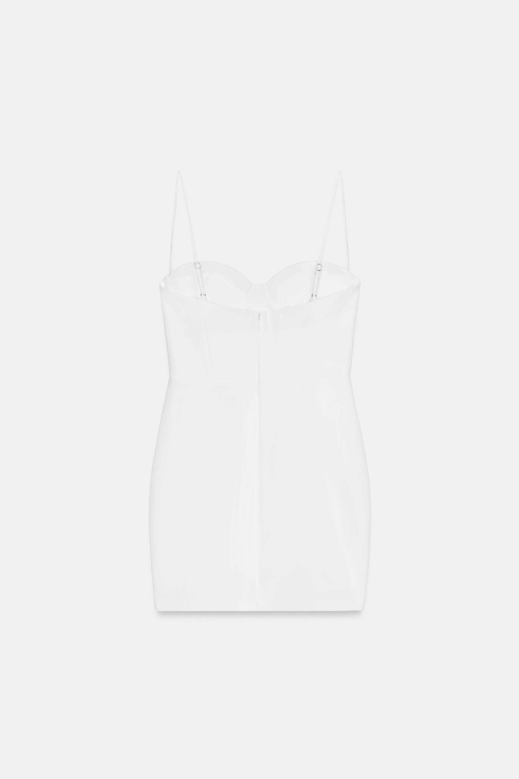 ROBE COURTE À BRETELLES ET POIS