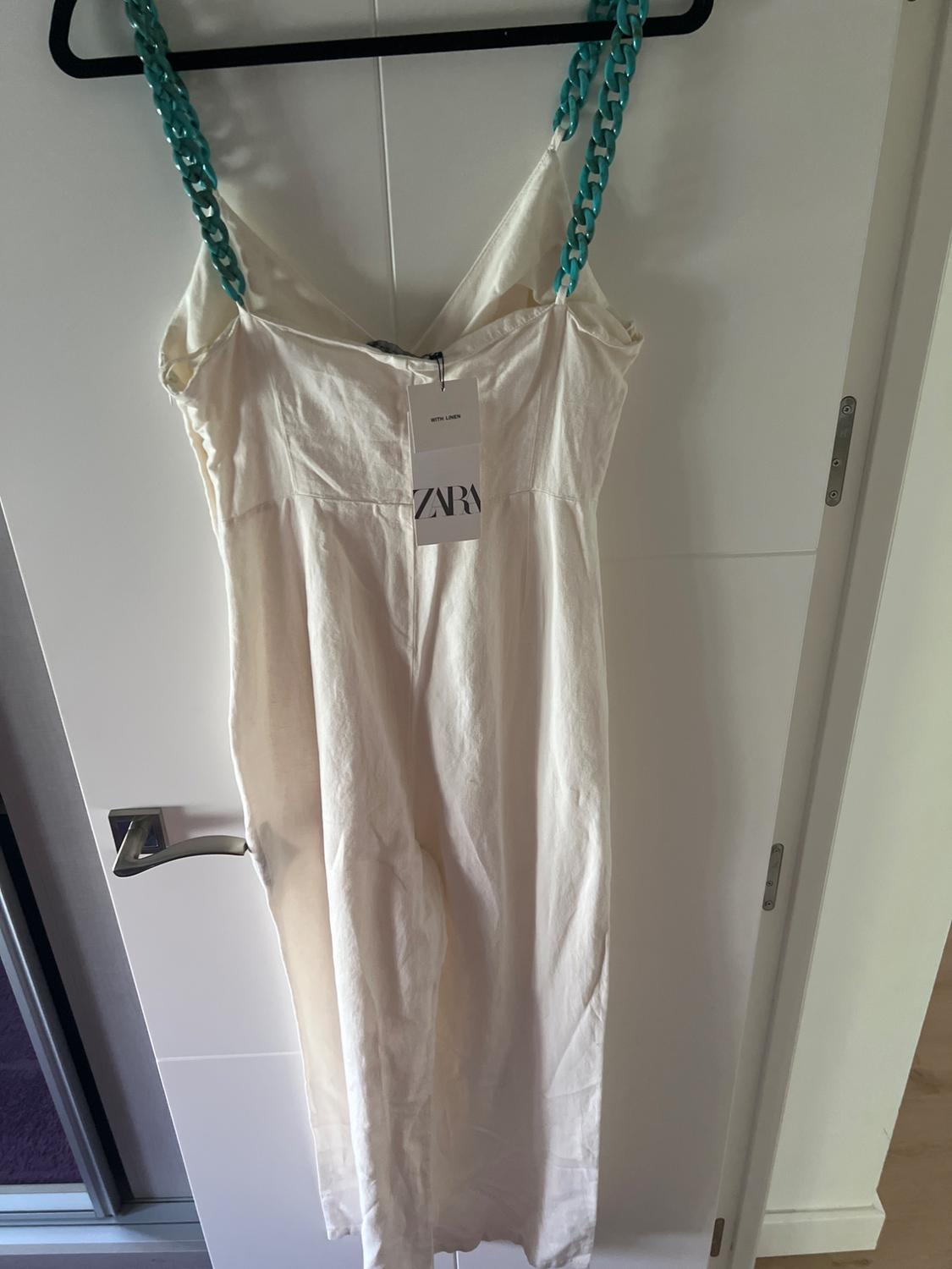 LINEN JUMPSUIT WITH CHAINS - Image 7