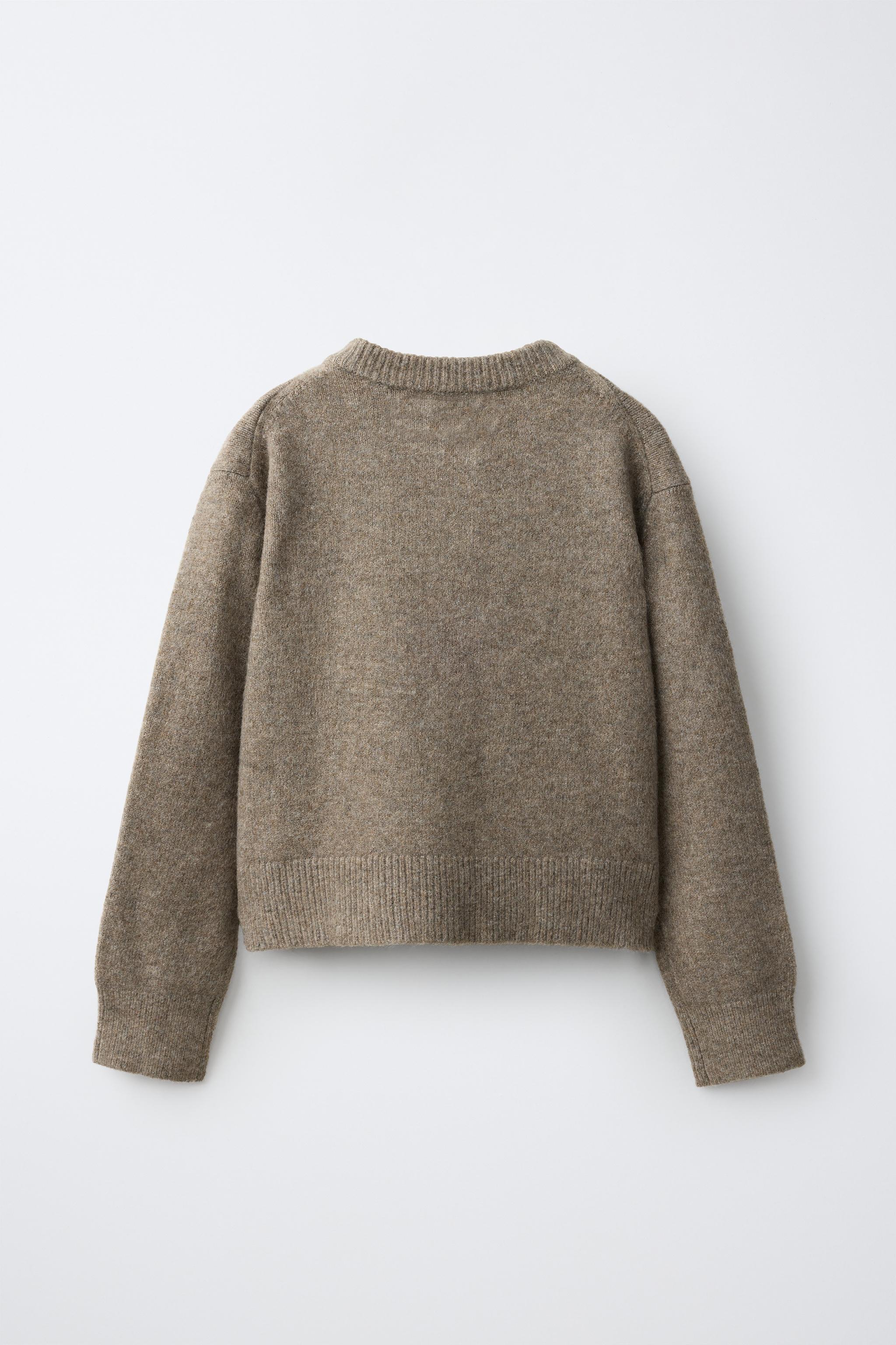 GILET EN MAILLE UNIE