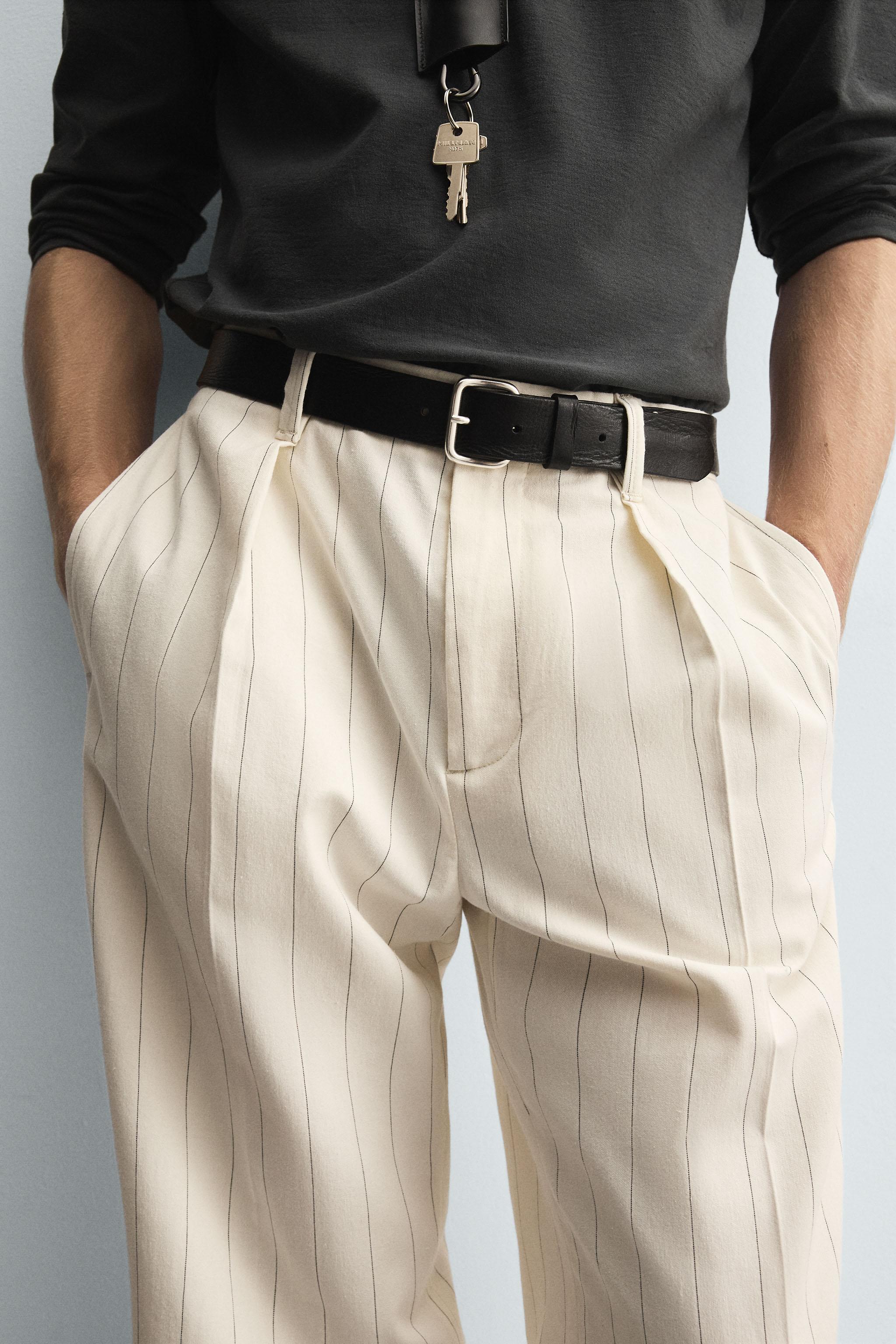 PLEATED STRIPE PANTS