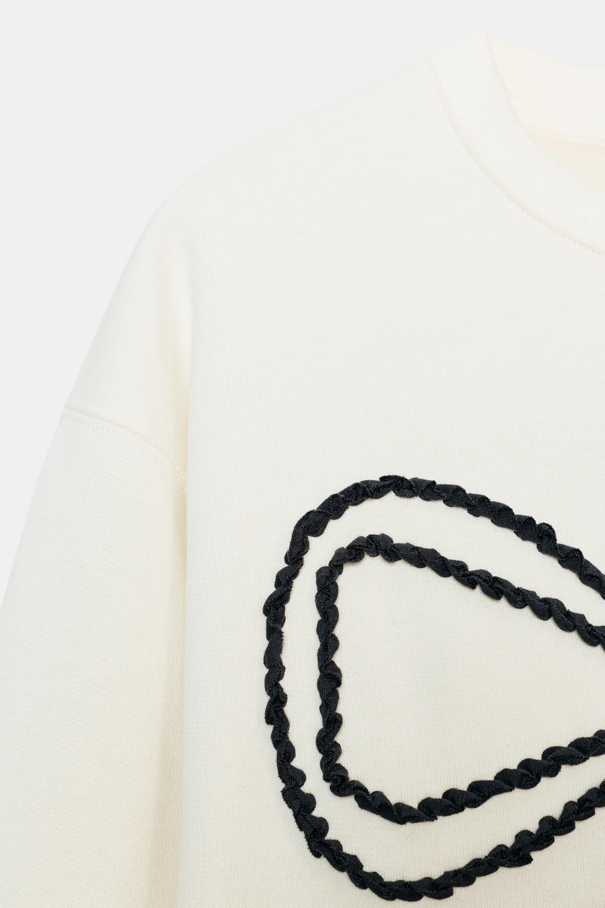 CONTRASTING BOW SWEATSHIRT