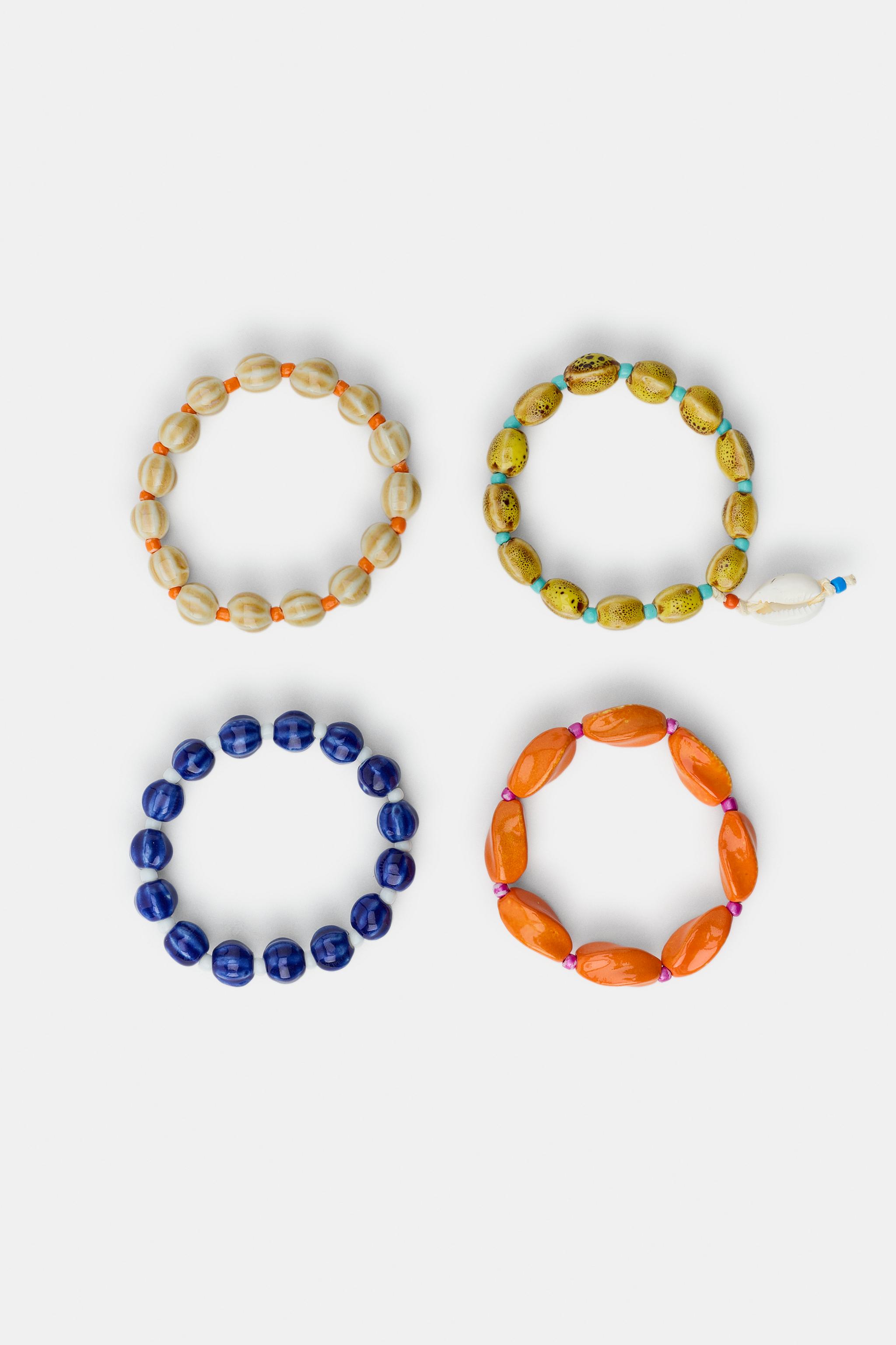 PACK OF 4 CERAMIC BEAD AND SHELL BRACELETS