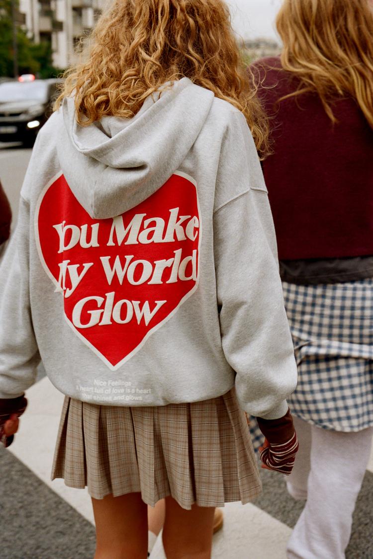 HEART PRINT SWEATSHIRT
