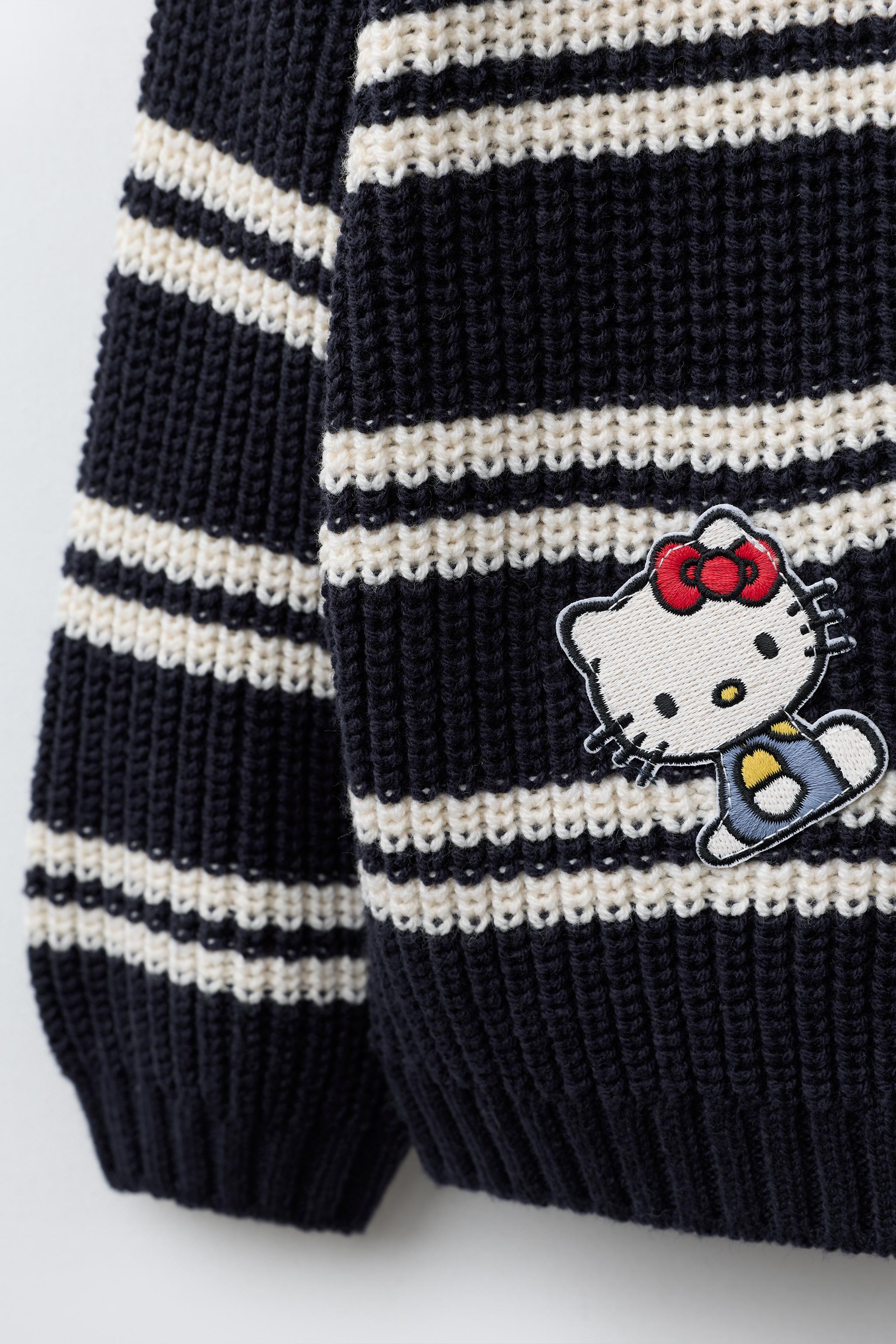 PULL EN MAILLE RAYURES PIÈCES HELLO KITTY © SANRIO
