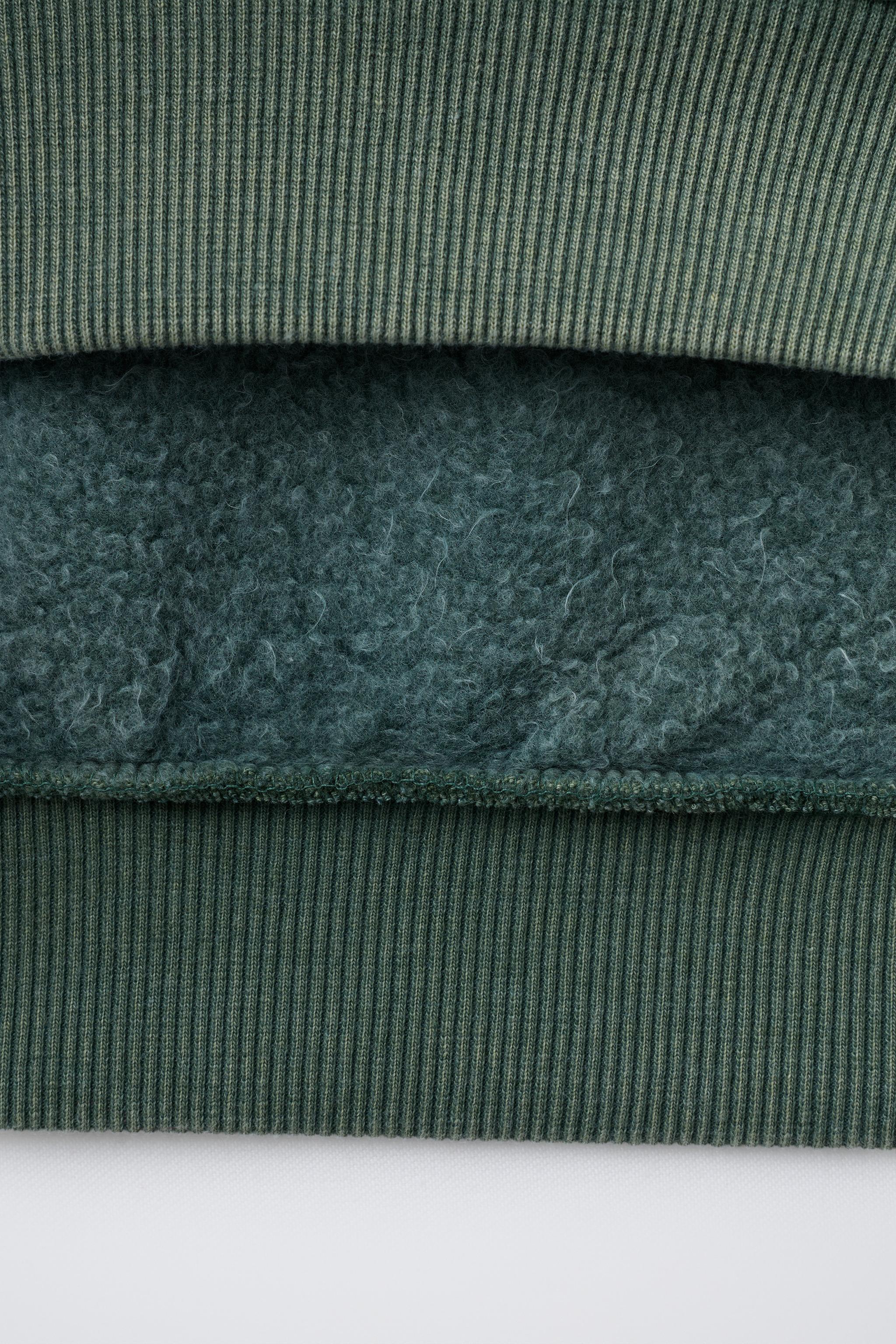 DOUBLE SLEEVE WASHED EFFECT SWEATSHIRT