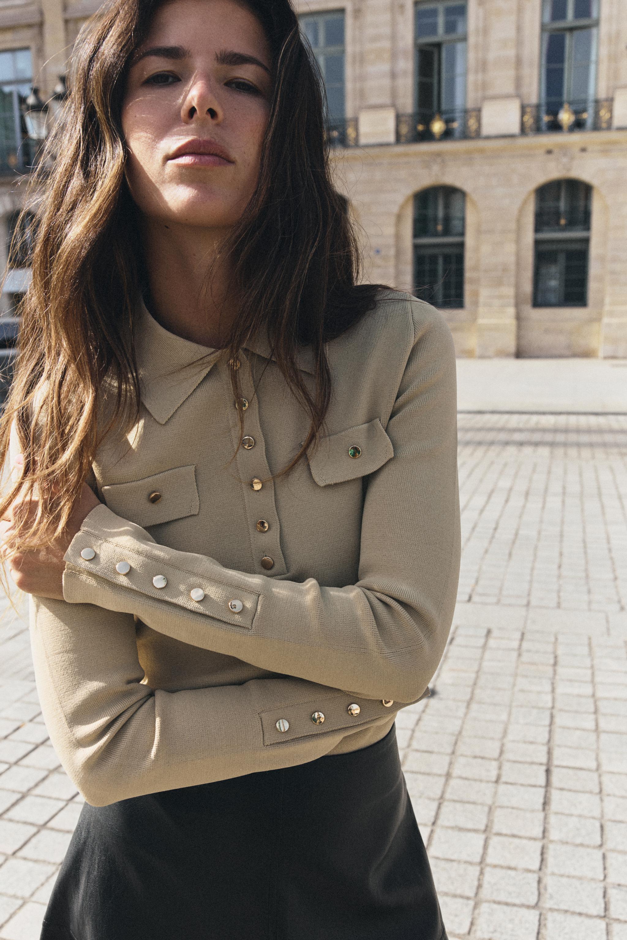 POLO EN MAILLE À PATTES DE BOUTONNAGE