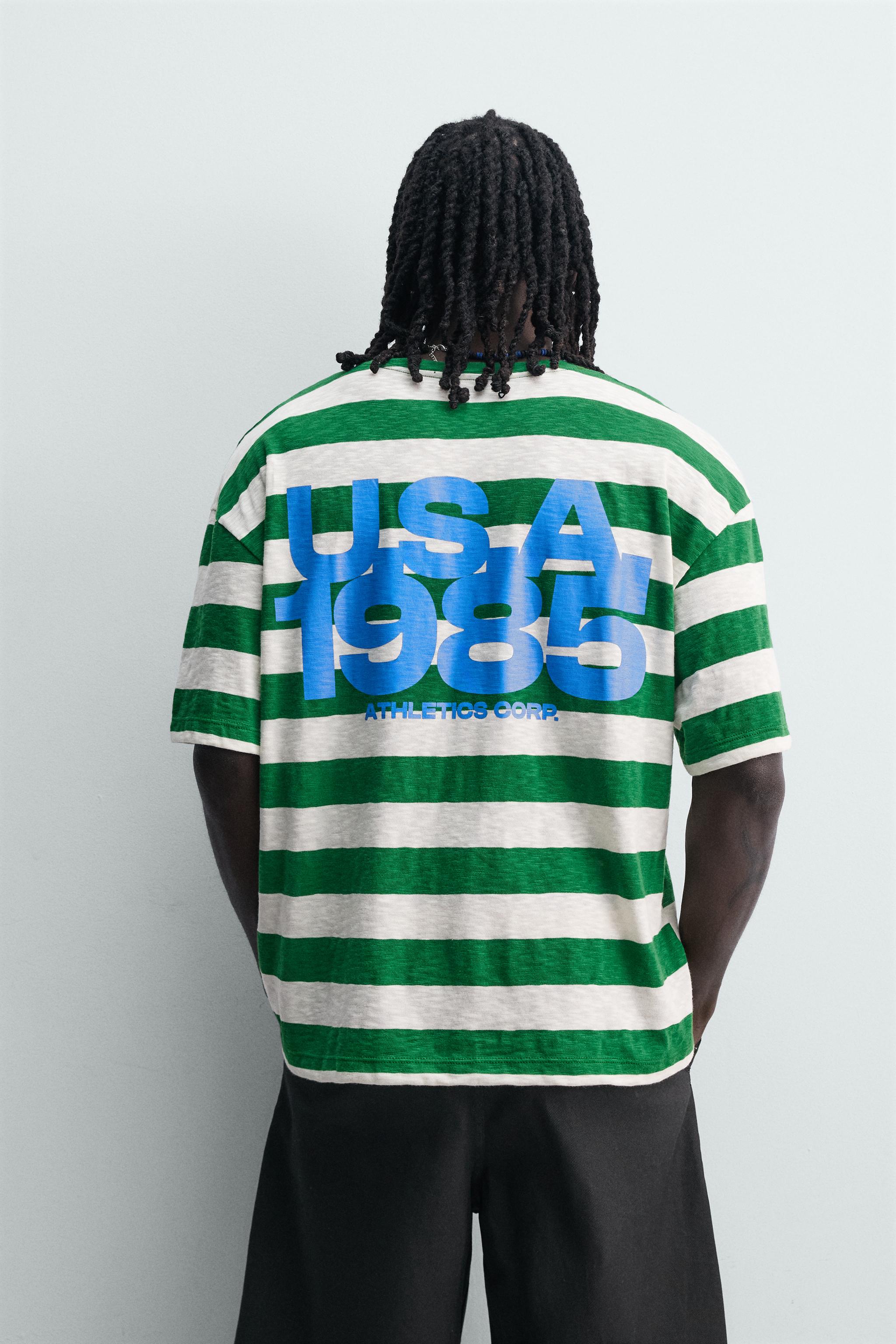 T-SHIRT À RAYURES AVEC IMPRIMÉ EN CONTRASTE