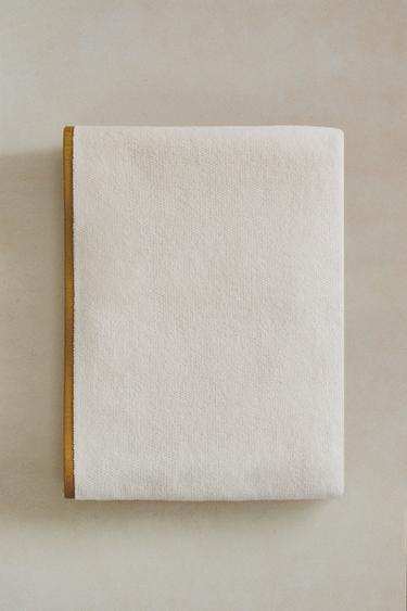 BATH TOWEL WITH DOUBLE TRIM - عاج الخاص بـ Zara