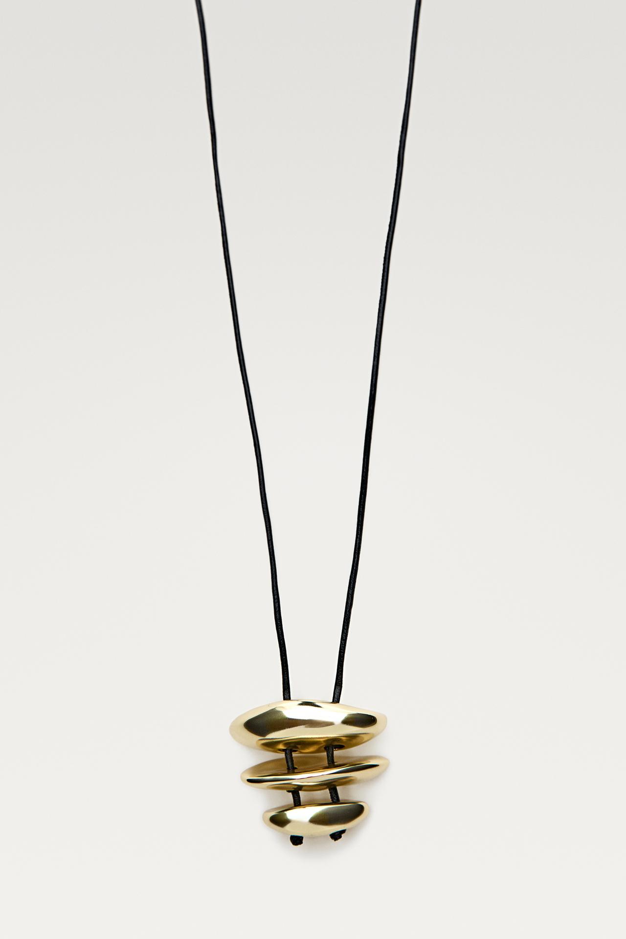 Long necklace with irregular pieces — Golden