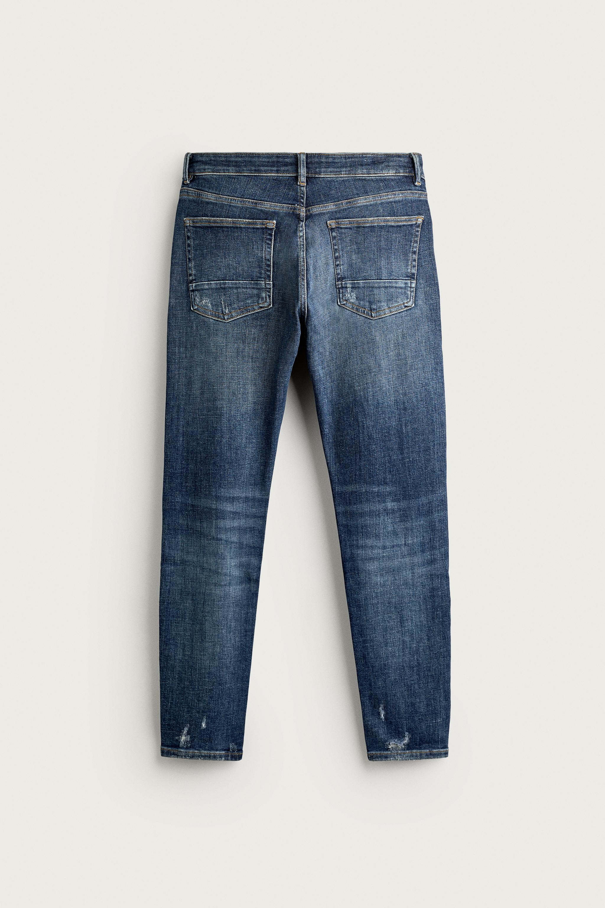 DISTRESSED SKINNY FIT JEANS