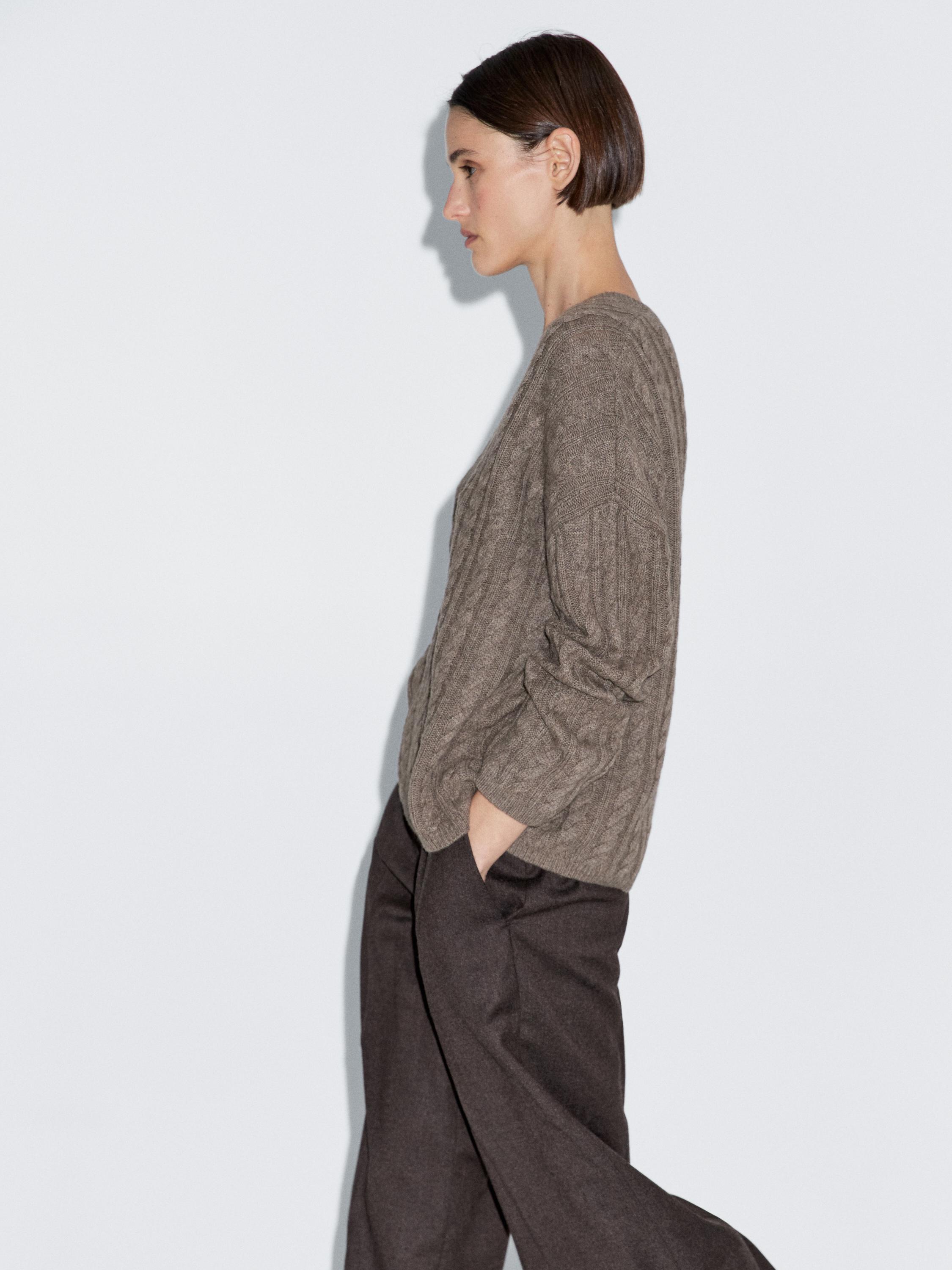 Cable-knit V-neck sweater