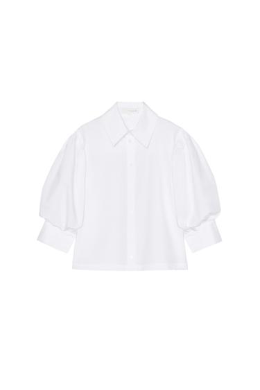Front view of a white blouse with puff sleeves and button-down fastening.