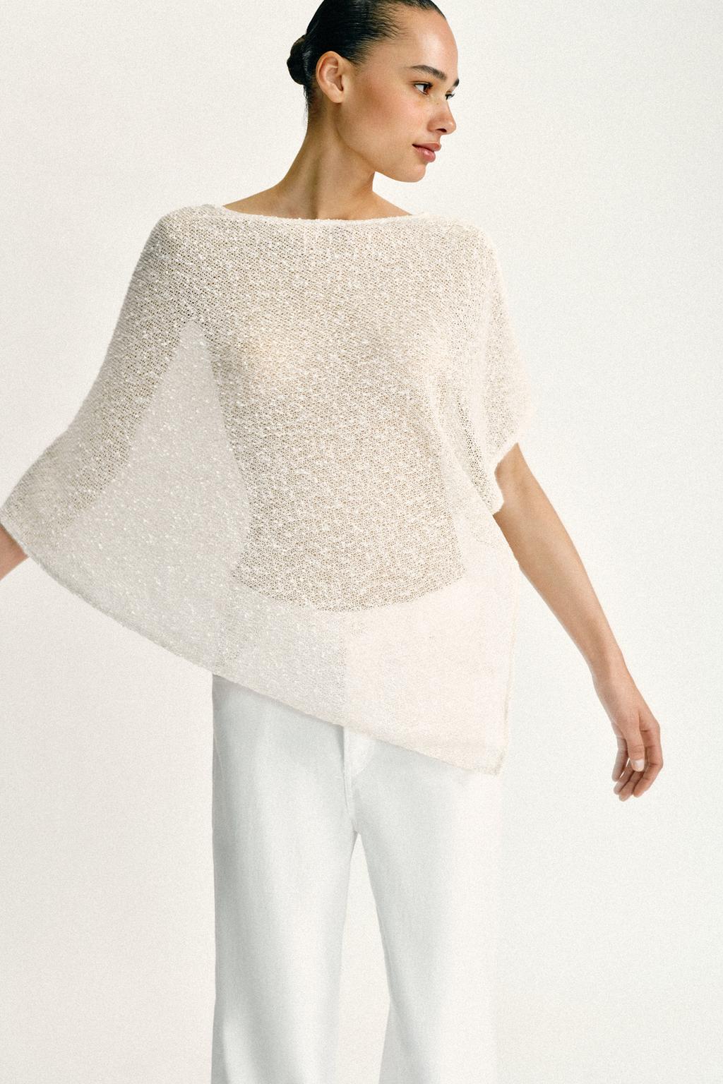 ASYMMETRIC METALLIC THREAD CAPE