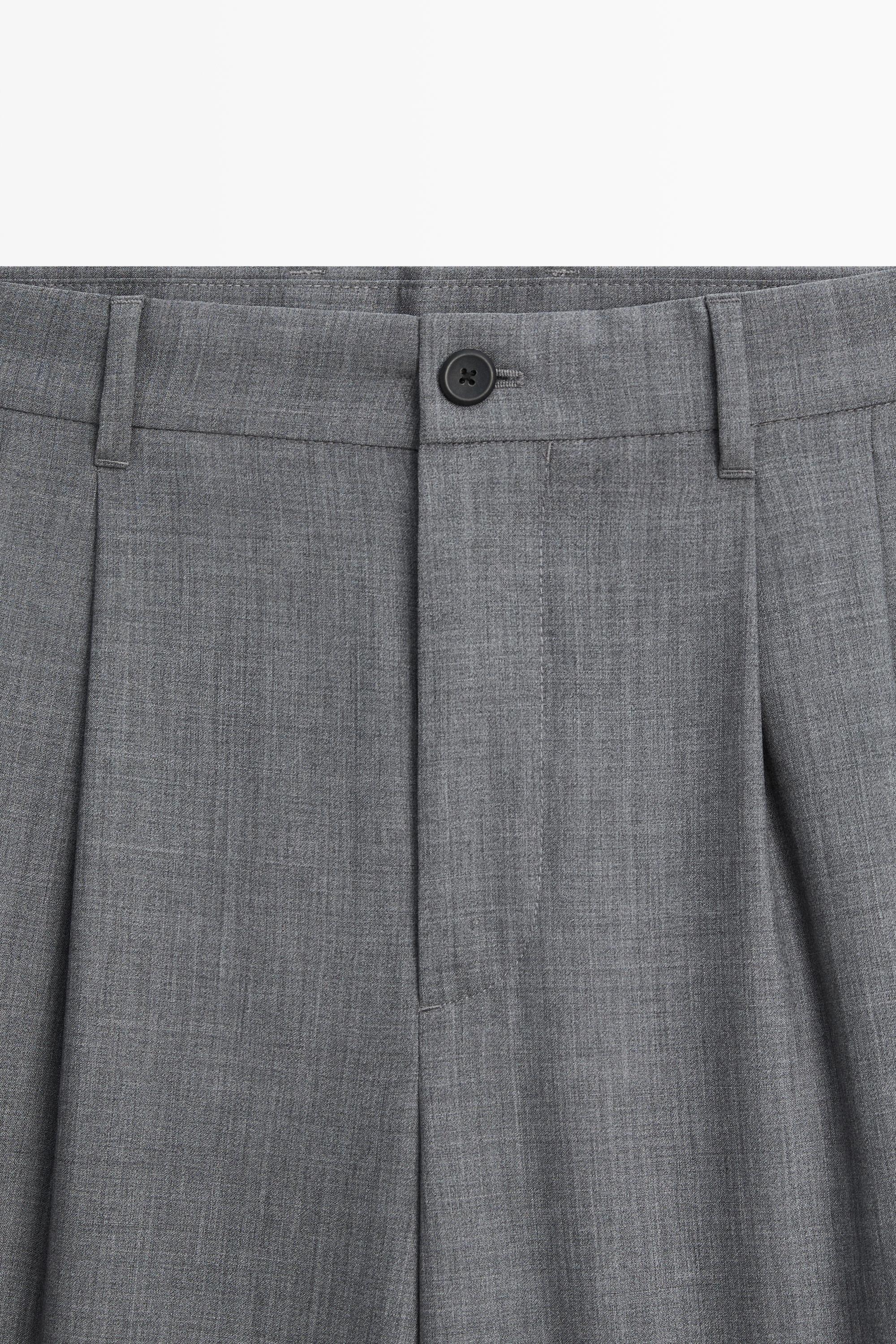 Pantalon relaxed fit à pinces en laine froide
