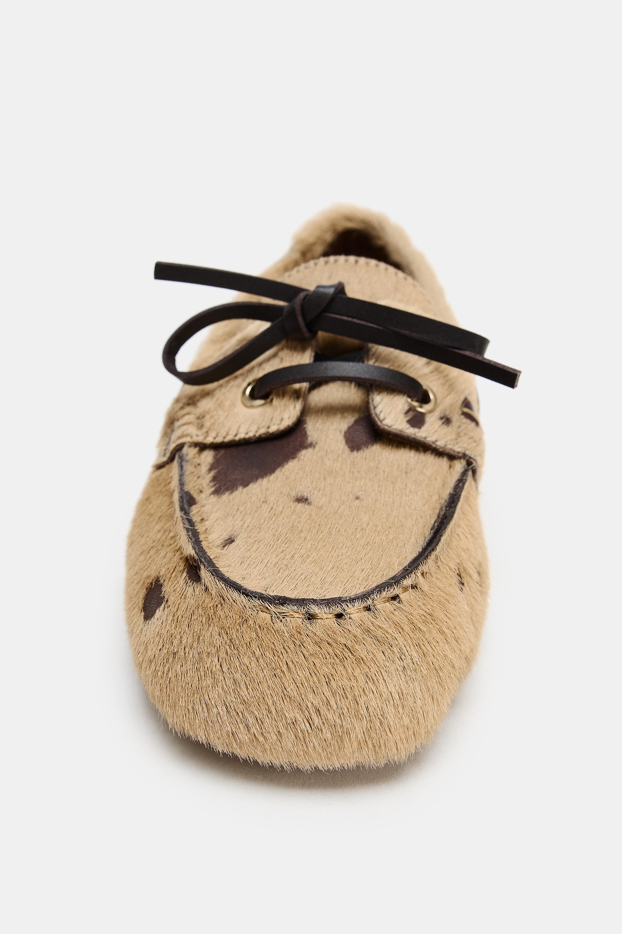 MOCASSINS EN CUIR AVEC EFFET FOURRURE ET IMPRIMÉ ANIMALIER