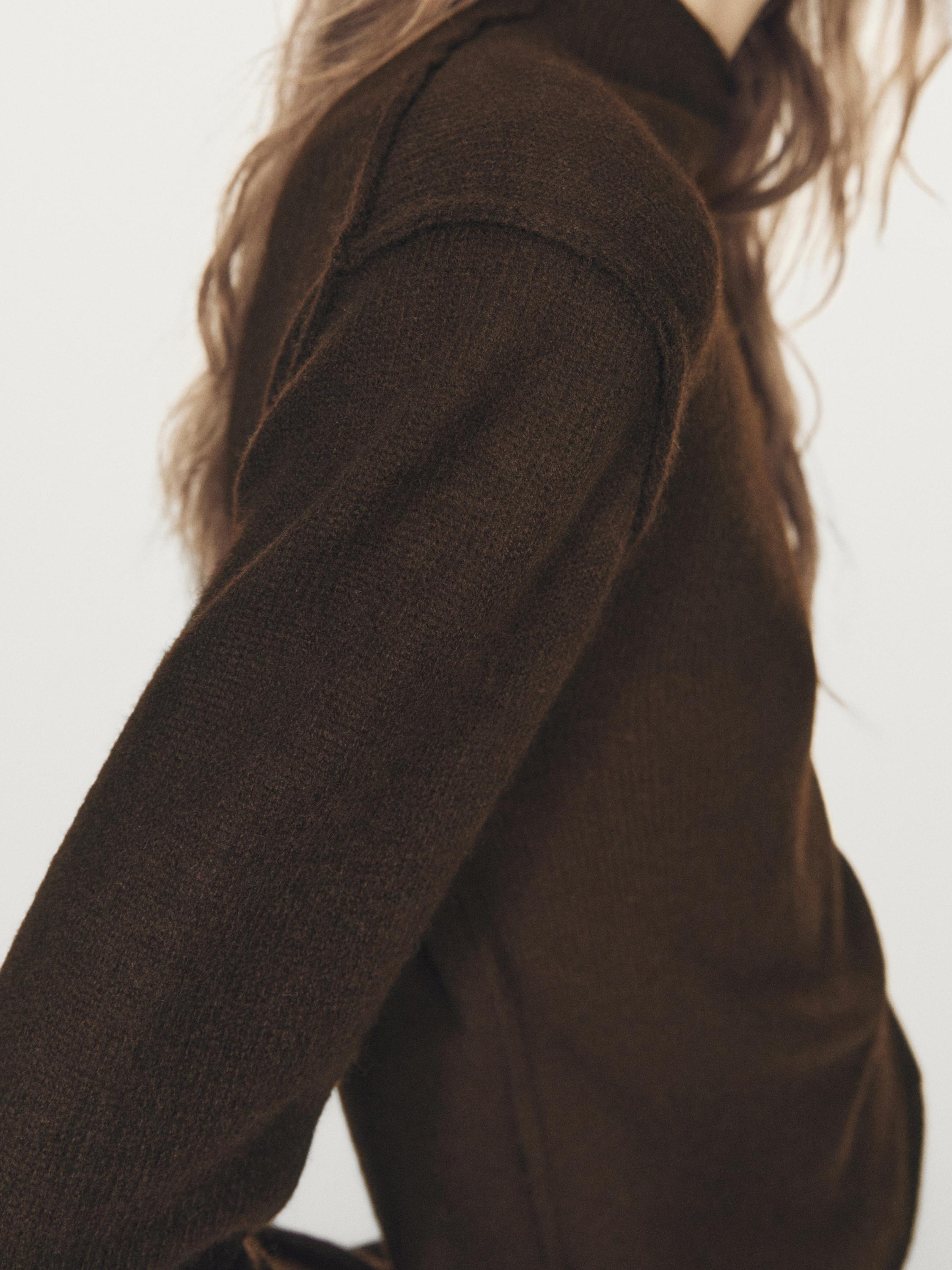 Pull à col montant en maille de laine mélangée