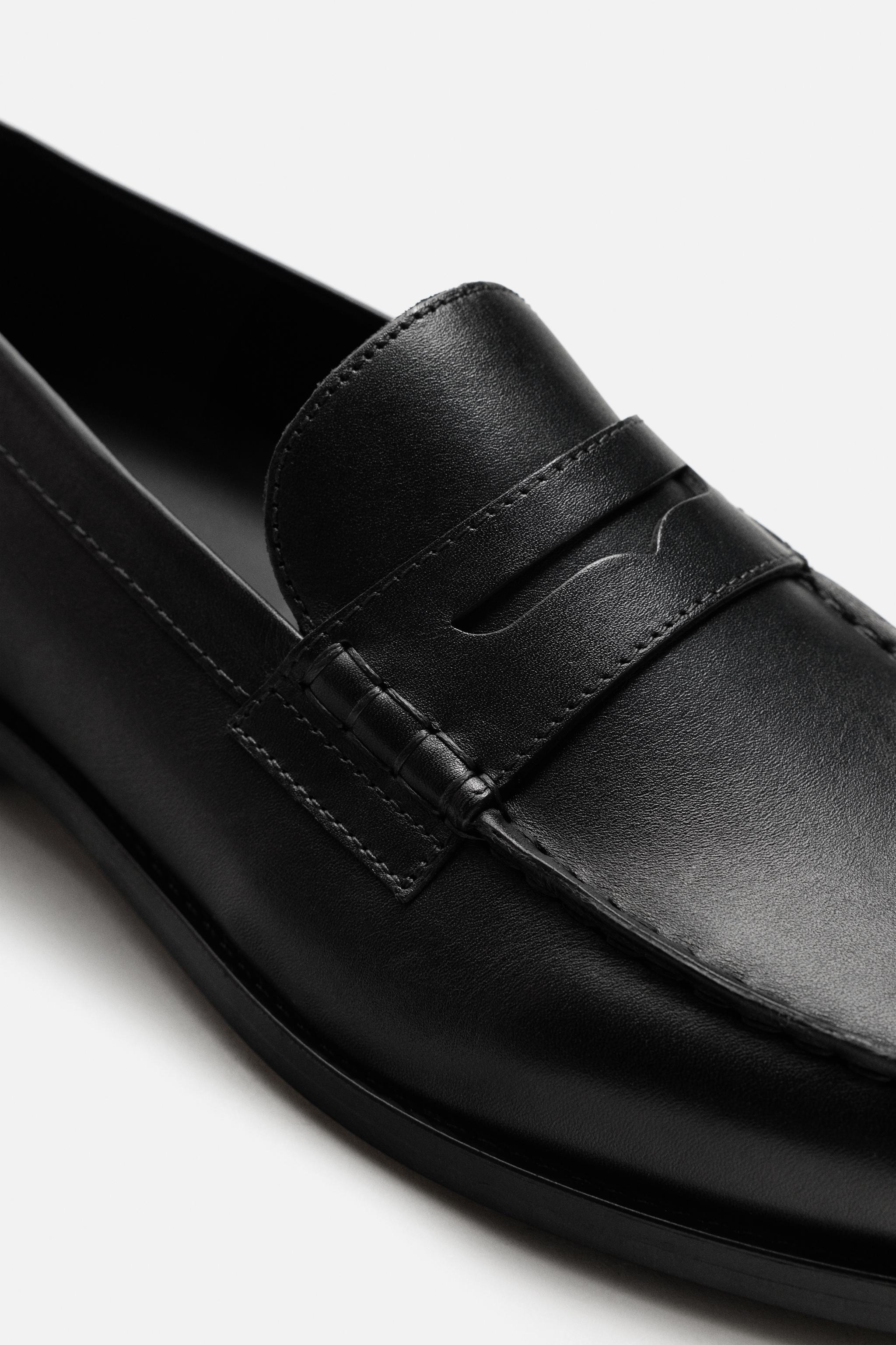 MOCASSINS EN CUIR AVEC MASQUE