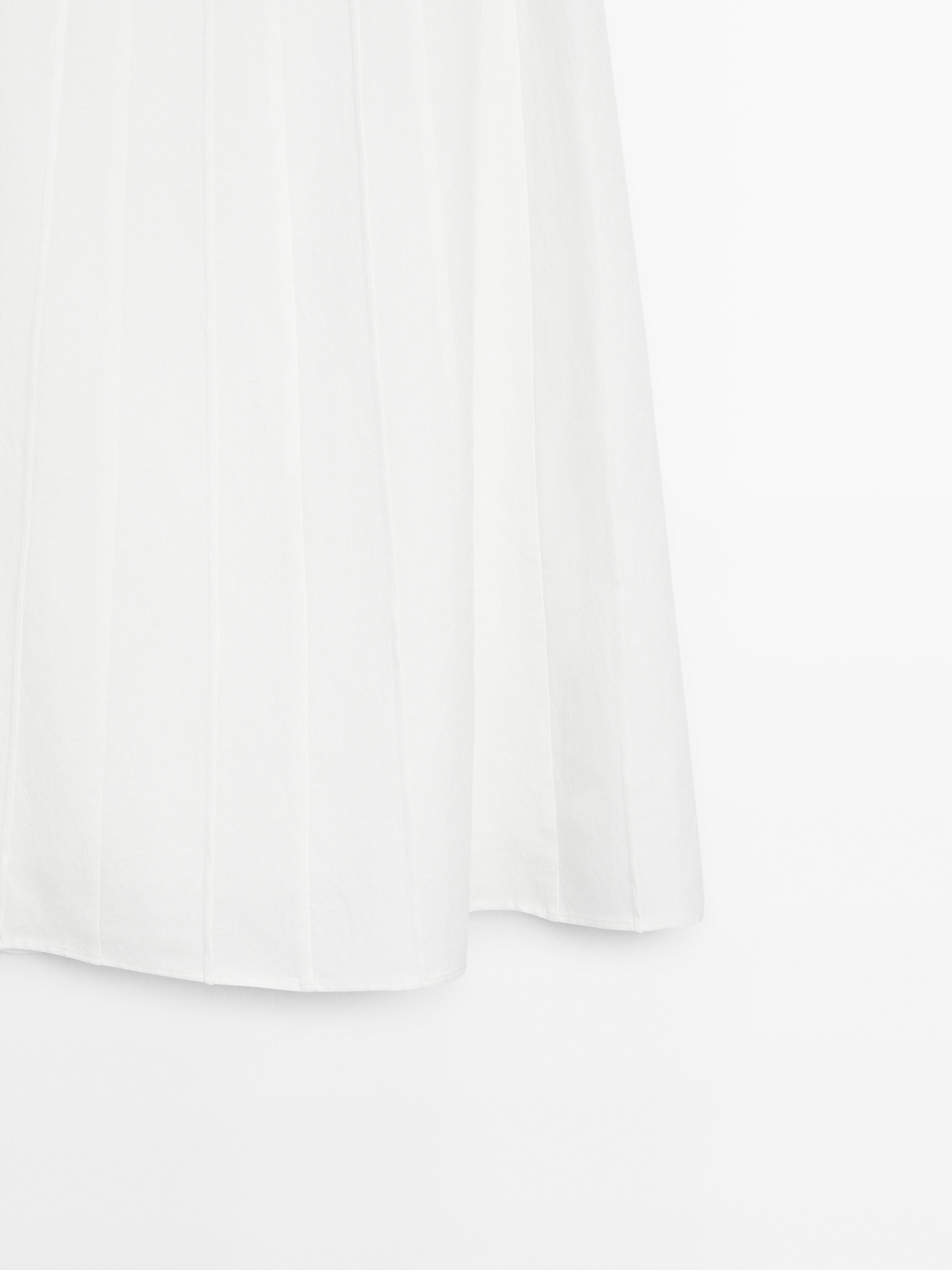 Jupe midi godets coutures apparentes