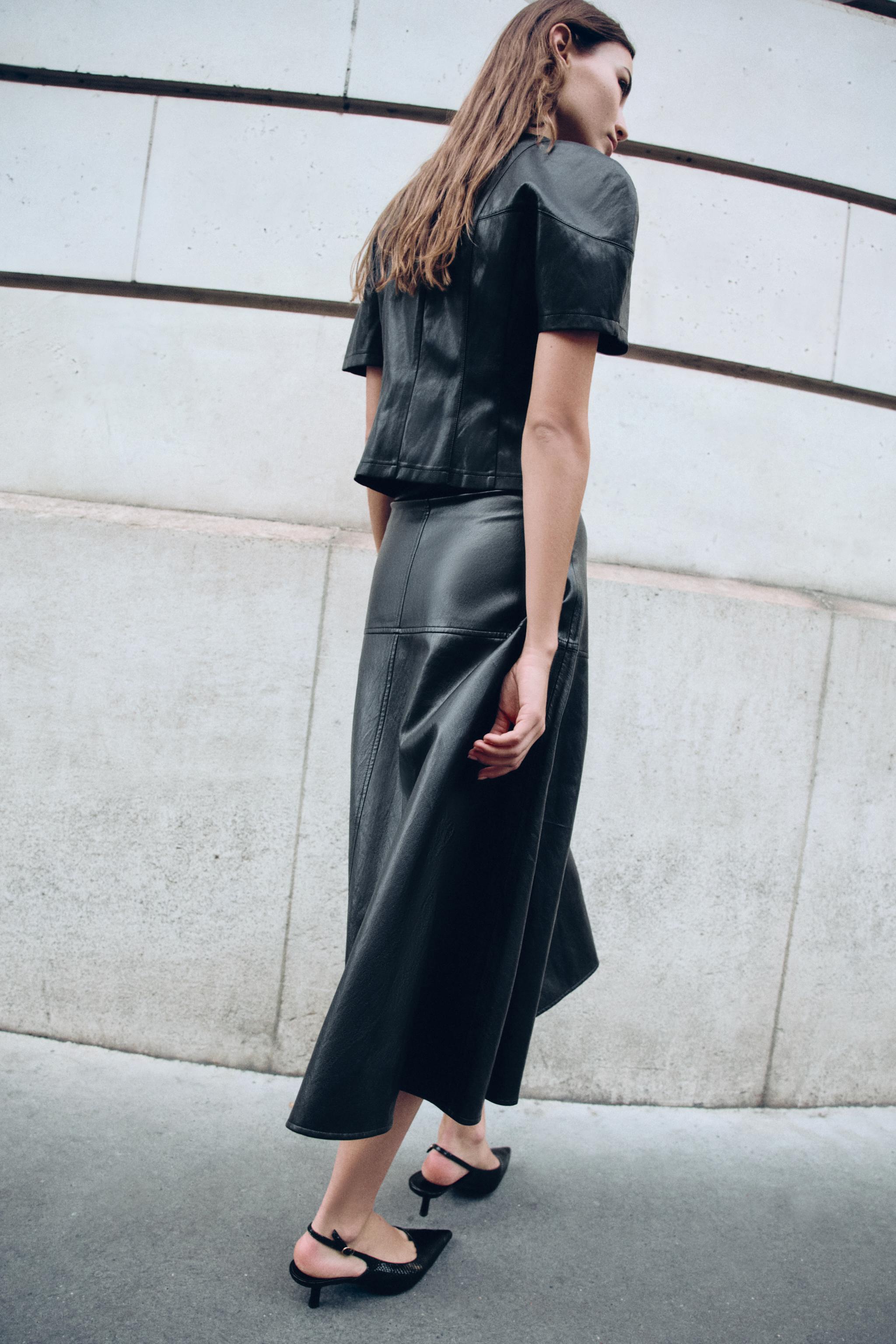 TOP MATIÈRE SYNTHÉTIQUE ZIP