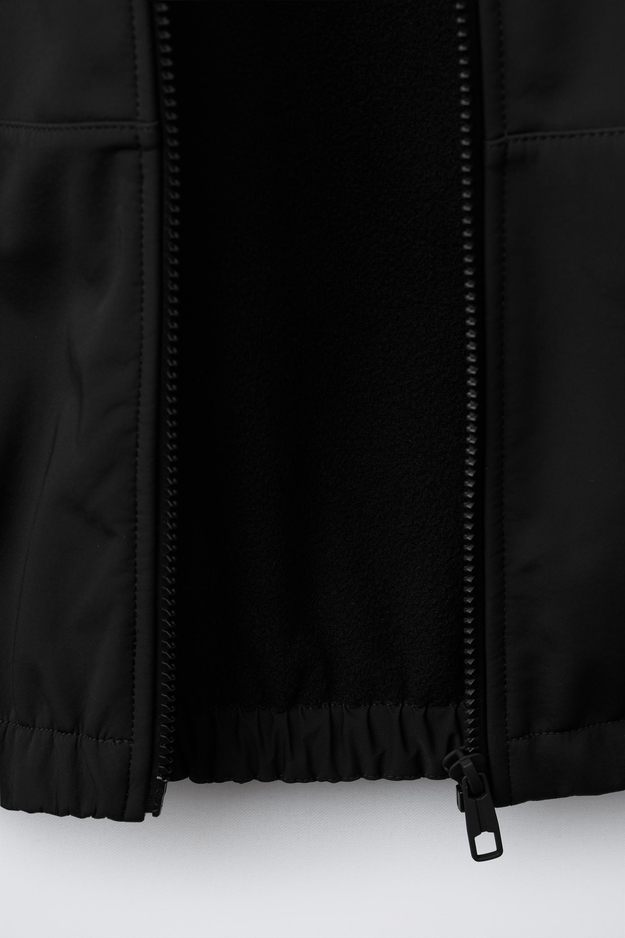 VESTE TECHNIQUE DOUBLÉE CAPUCHE DÉPERLANTE