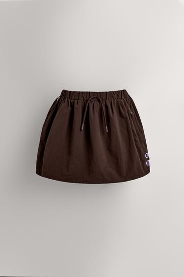 JUPE-SHORT EN NYLON CHAMPION ® X ZARA - Marron de Zara