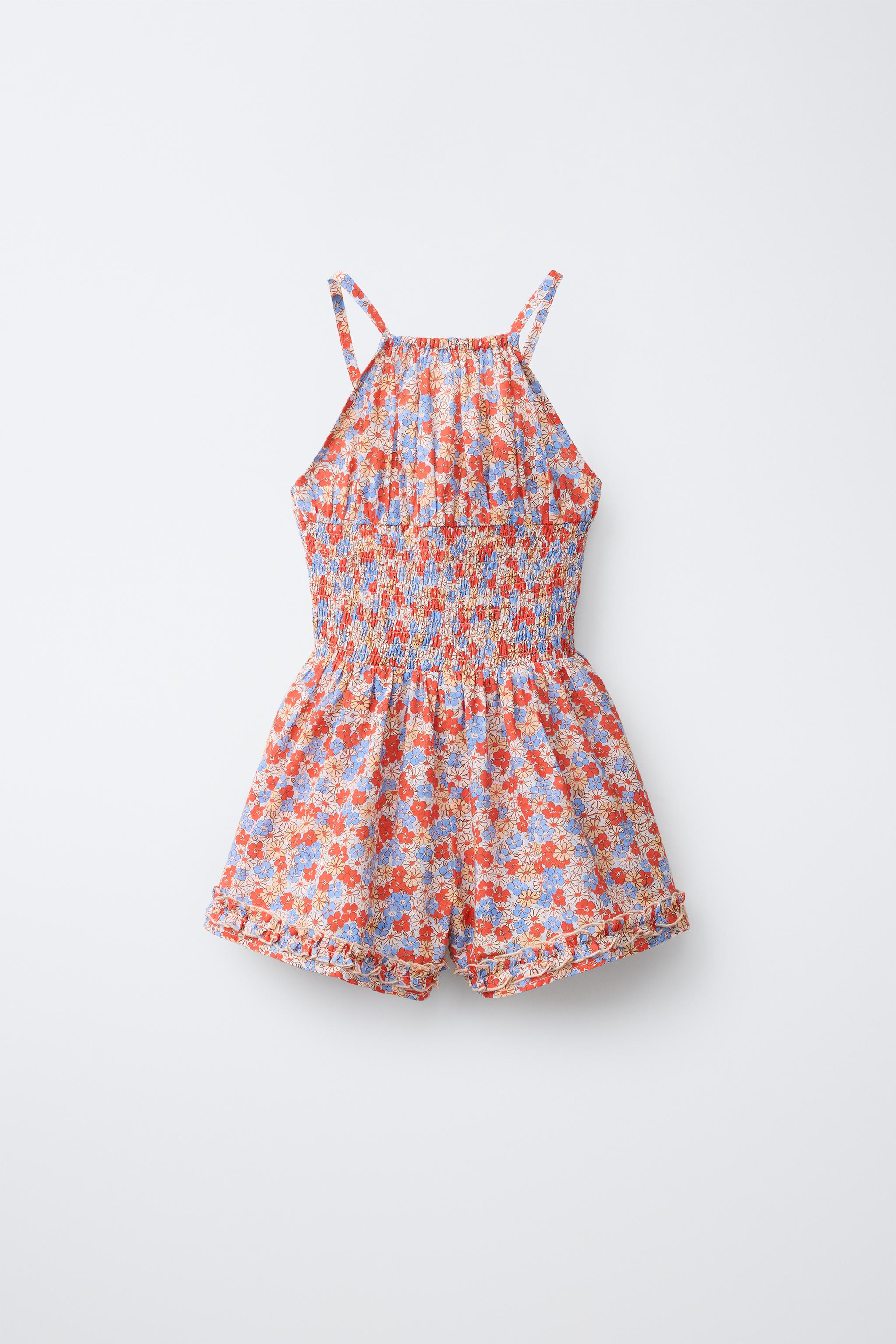 SHORT RUFFLED FLORAL JUMPSUIT