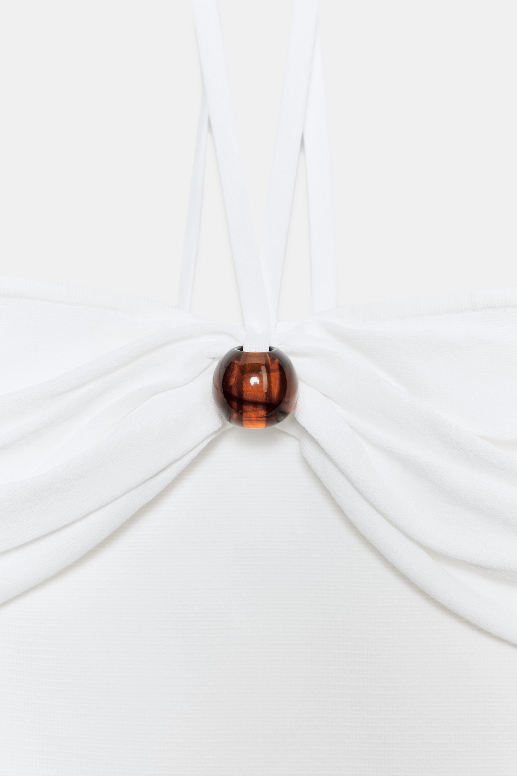 HAUT BANDEAU EN MAILLE AVEC FANTAISIE