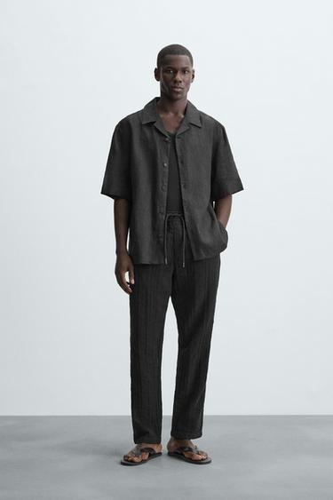 БРЮКИ RELAXED FIT ИЗ РЕЛЬЕФНОЙ ТКАНИ — ЧЕРНЫЙ от Zara