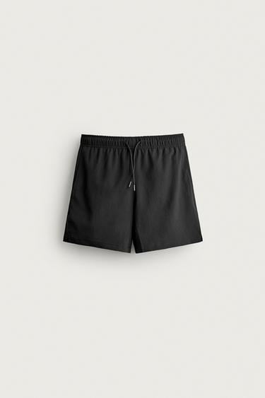 ثوب سباحة متوسط الطول بملمس غير منتظم - أسود الخاص بـ Zara