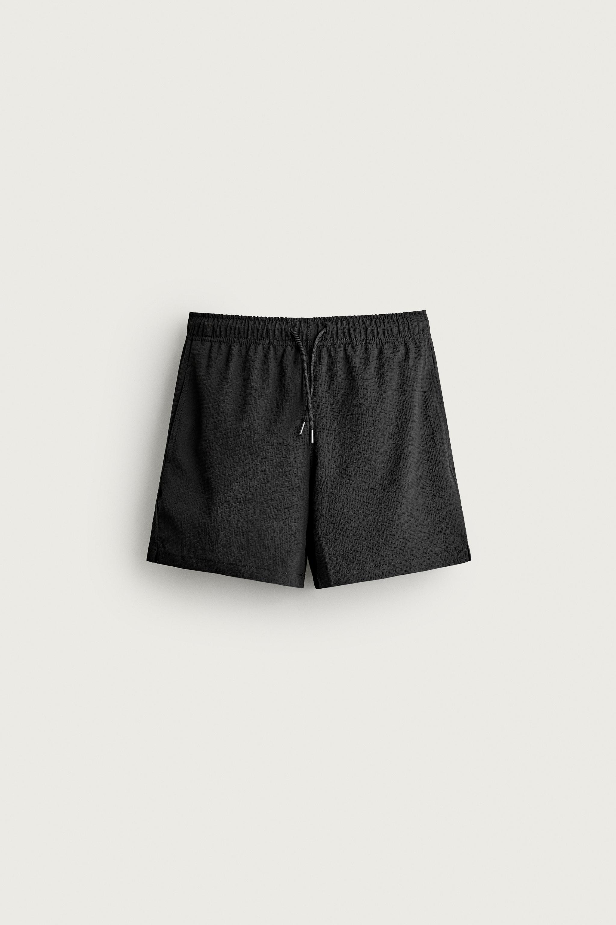 TEXTURED MID-LENGTH SWIMSUIT