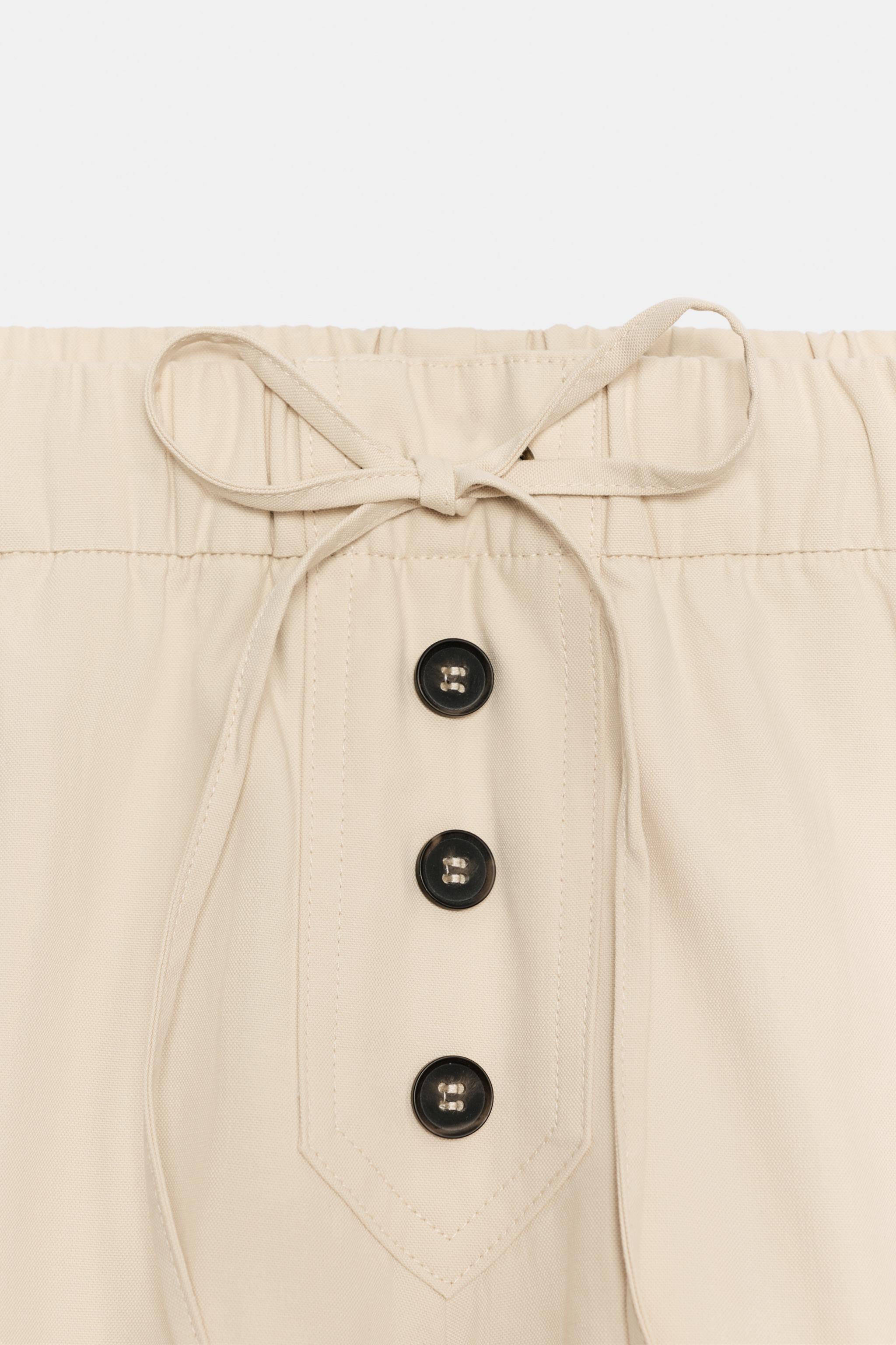 ELASTIC WAIST SHORTS WITH BUTTONS